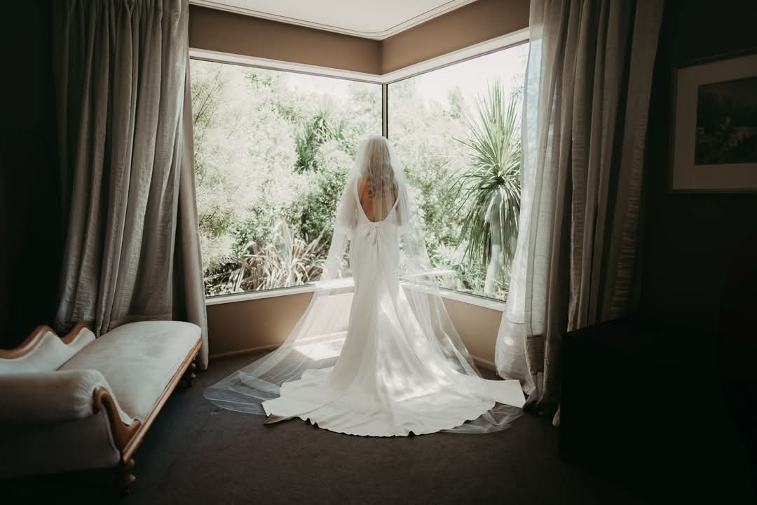 A serene wedding morning with the bride enjoying a quiet moment before the big day.