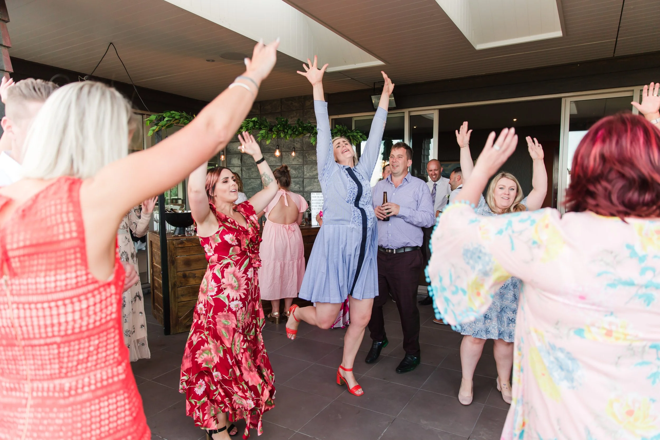 Wedding guests enjoying the reception at Waipuna Estate
