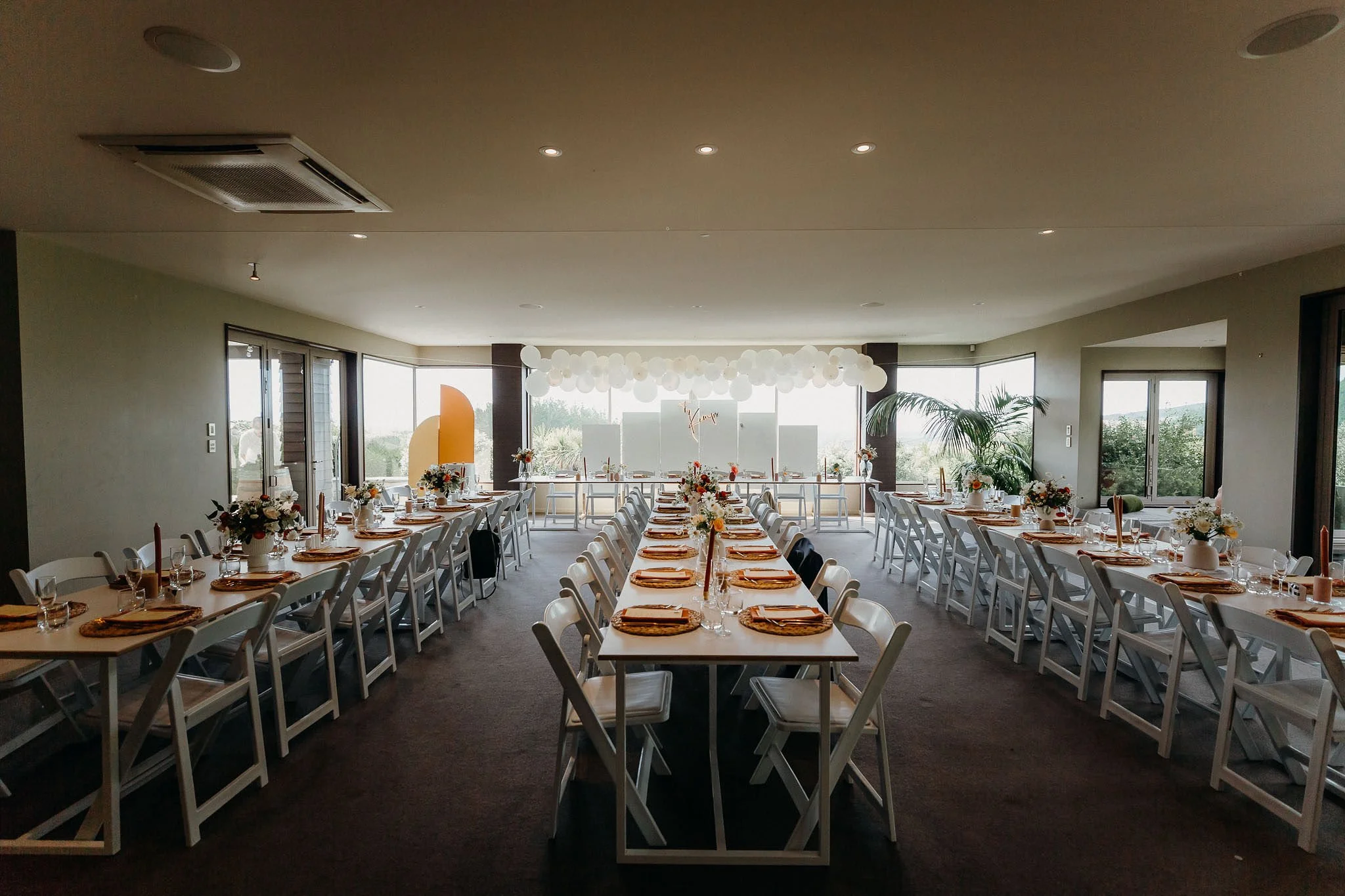 Elegant wedding reception styling prepared inside Waipuna Estate