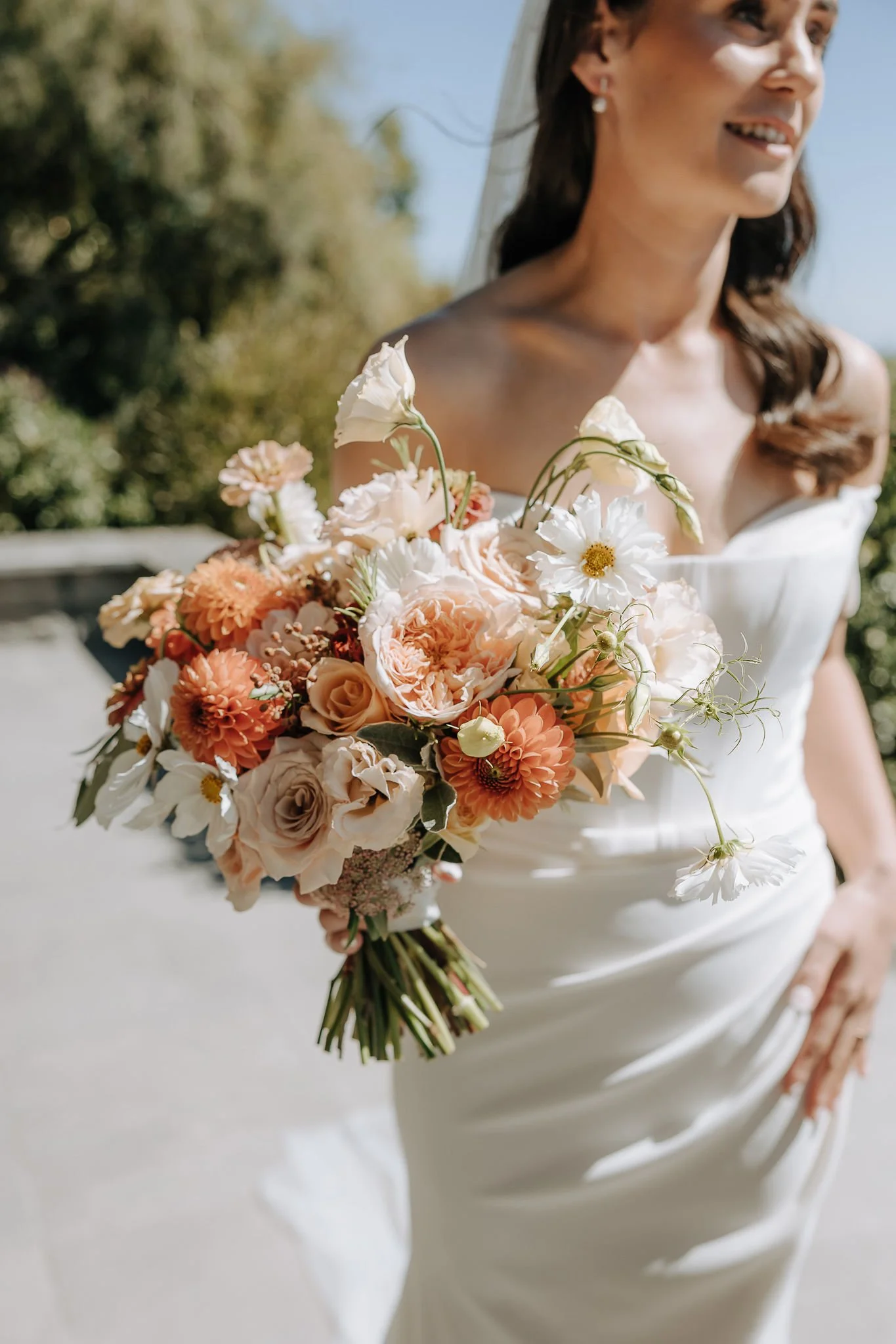 Bridal bouquet featuring seasonal wedding flowers designed for a Waipuna Estate wedding