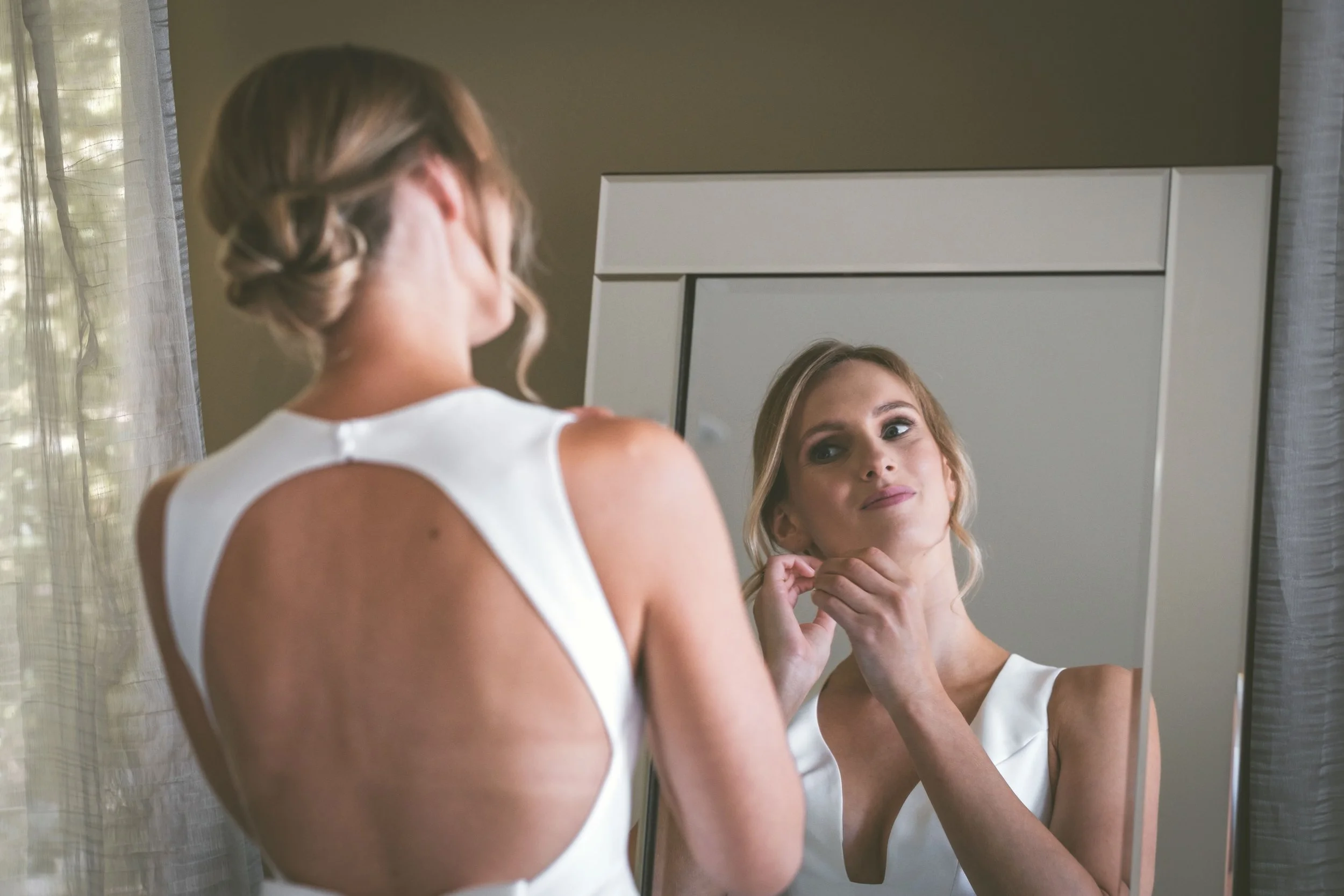 a bride getting ready on her wedding morning, surrounded by calm moments before the ceremony