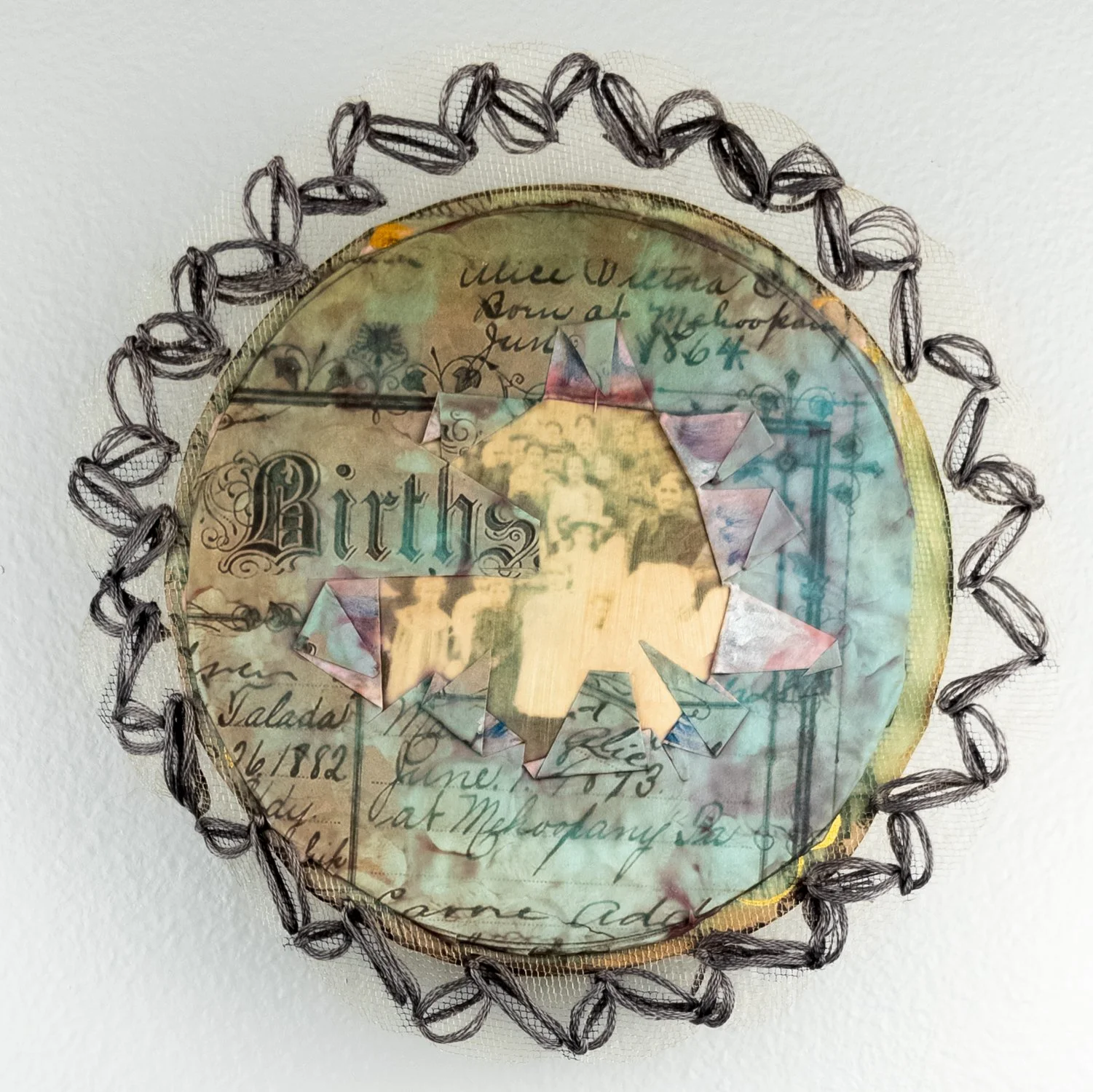   Born Into Memory   
Mixed Media Collage Attached to Wood   6.5" x 6.5" circle