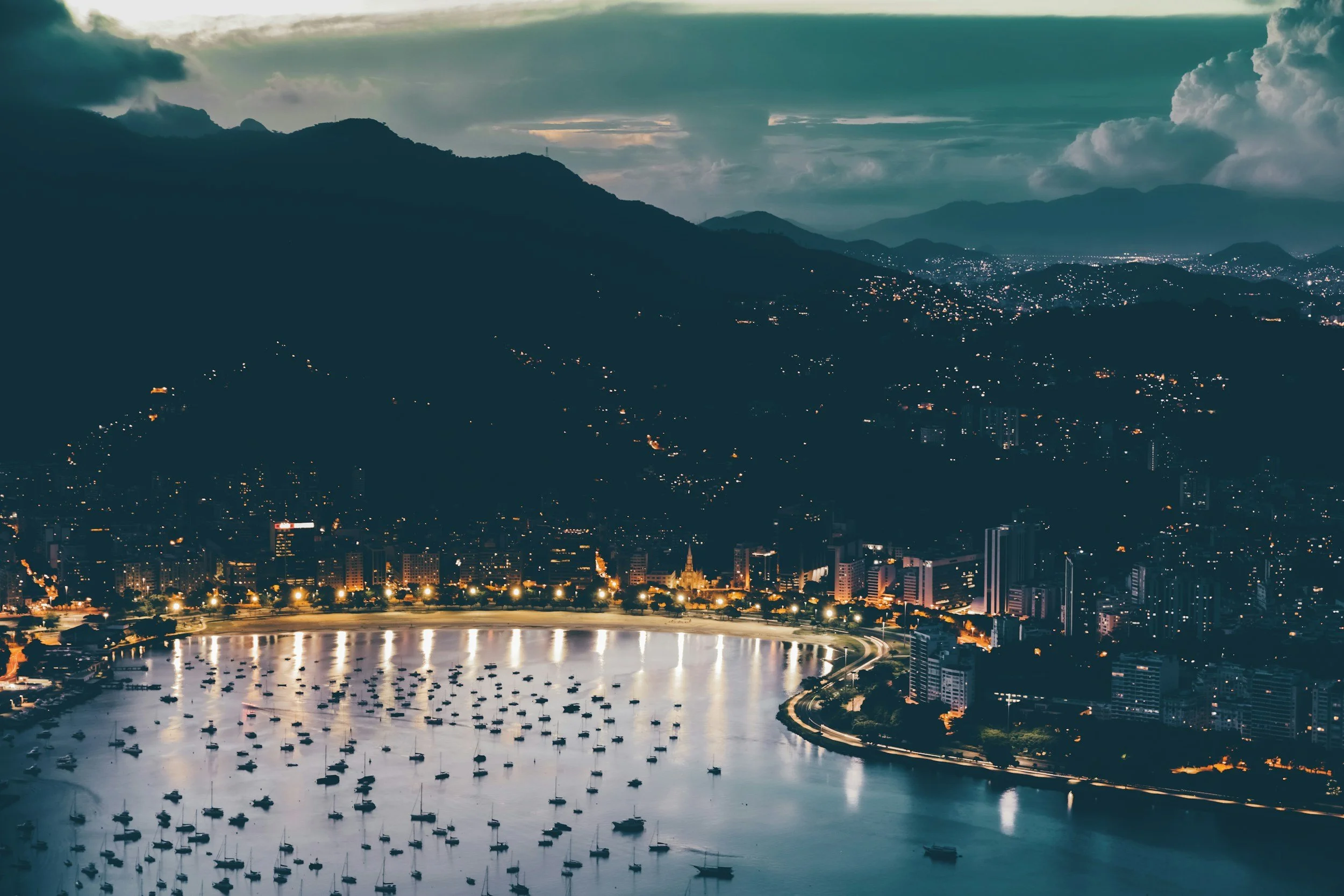 bay with boats at night