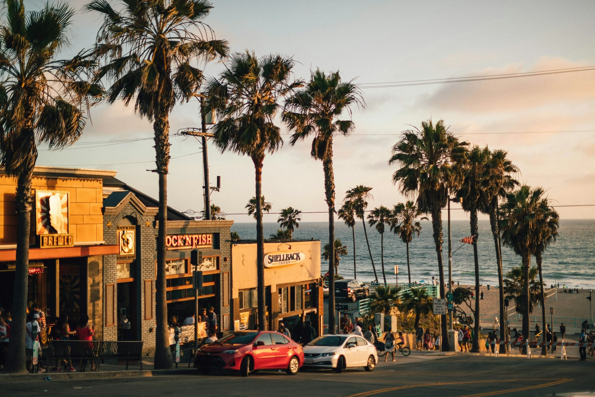 cars parked by beach in la