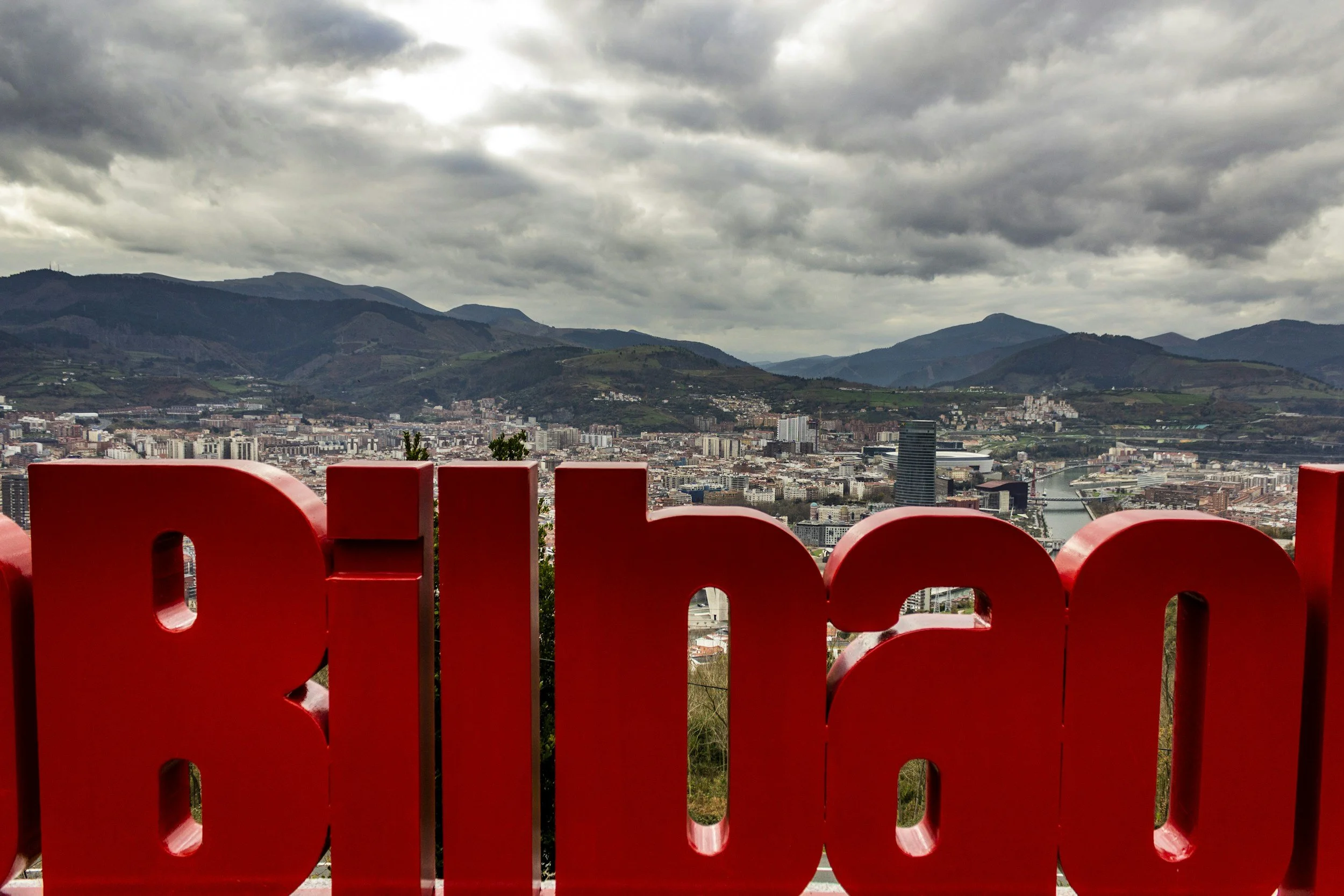 bilbao sign and city behind