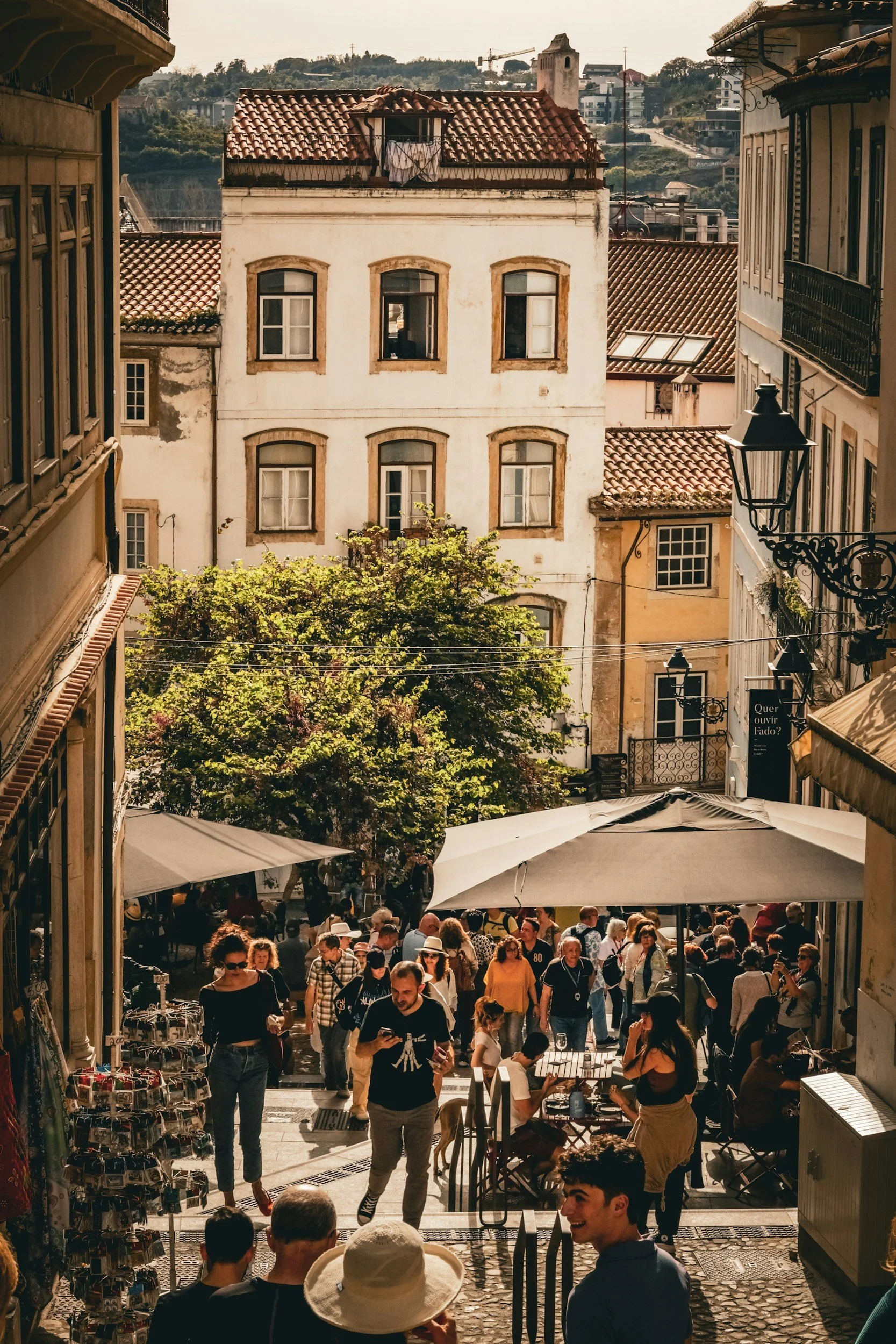people in the street coimbra portugal sunset