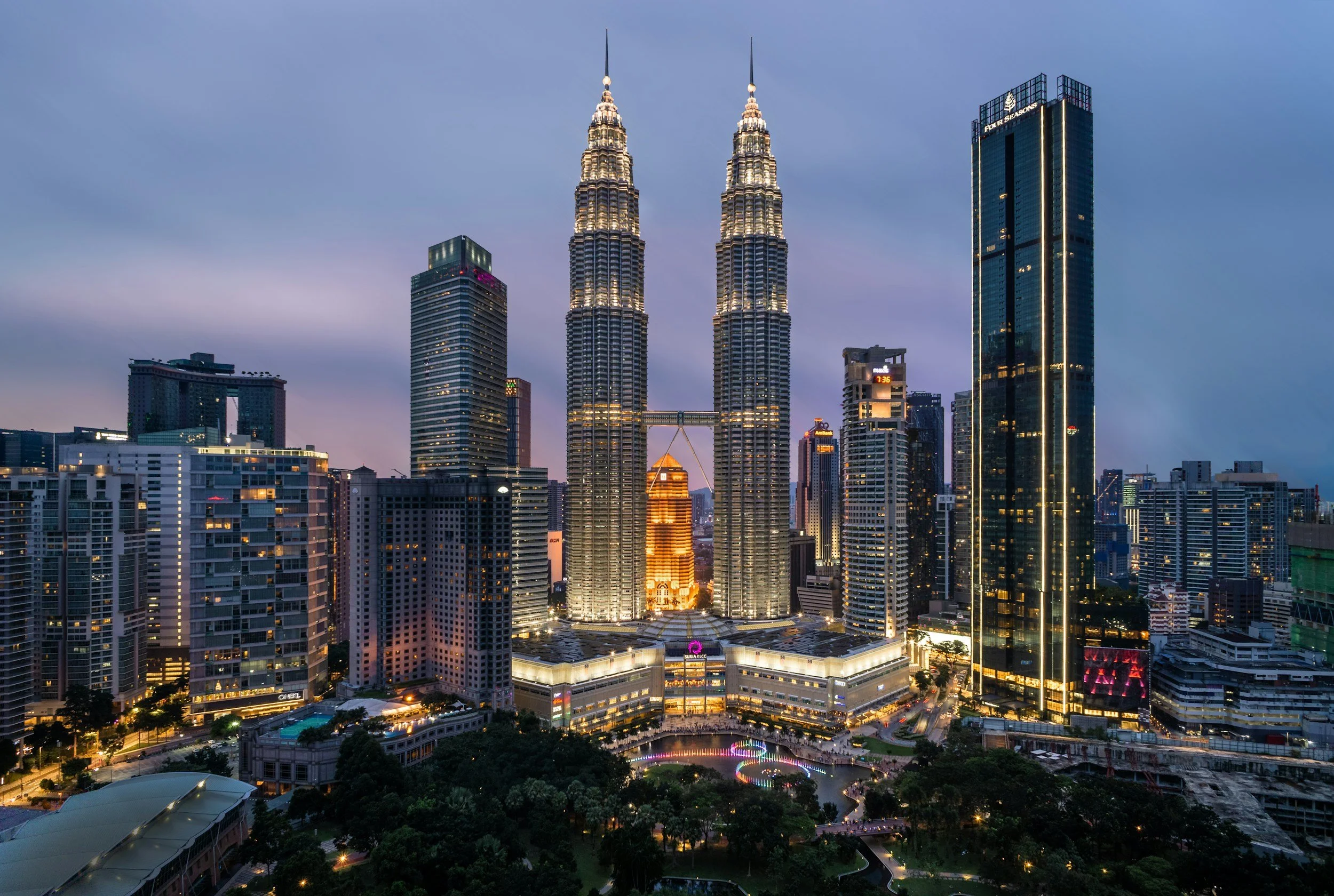 petronas towers kuala lumpur lit up at night