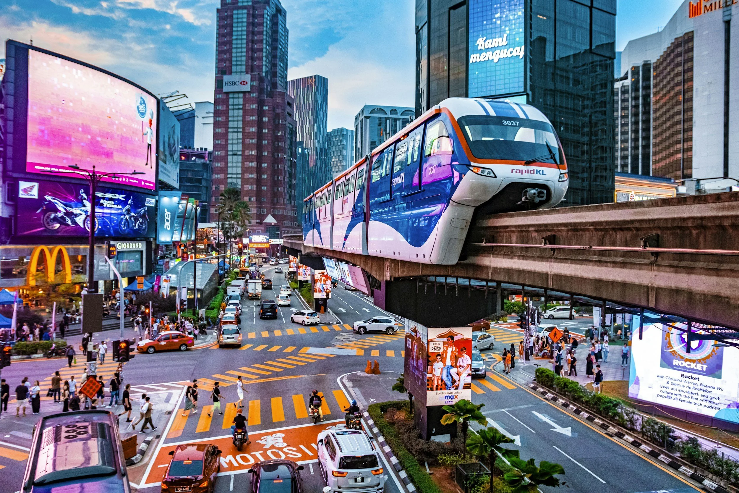 colourful skyrail and city beneath kuala lumpur central