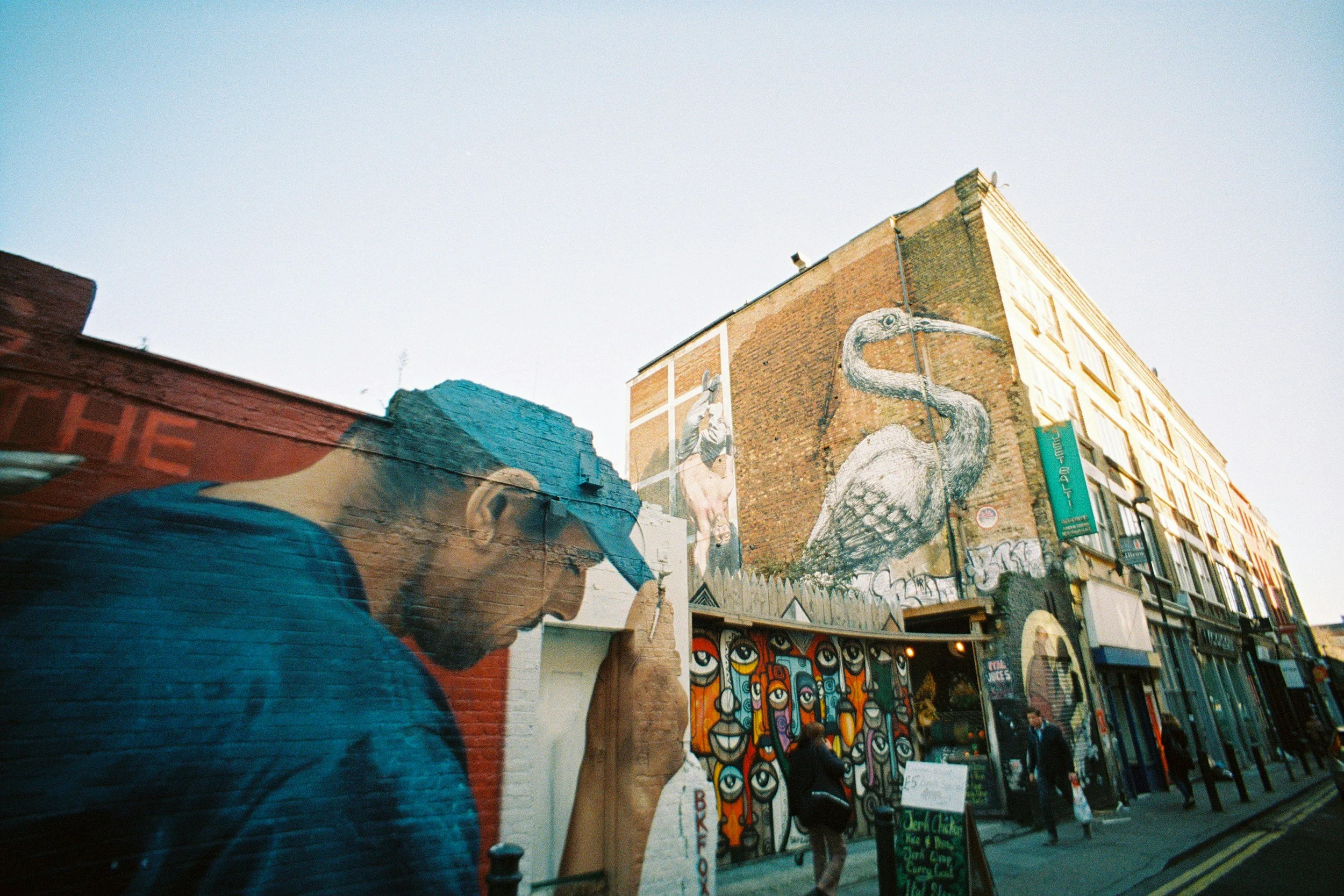 painter mural on londons brick lane