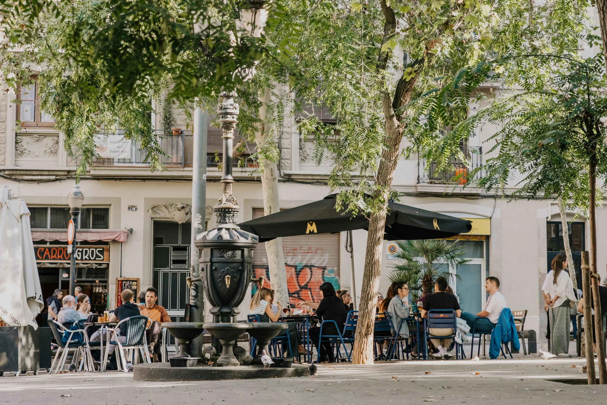 people eating outside barcelona sunshine