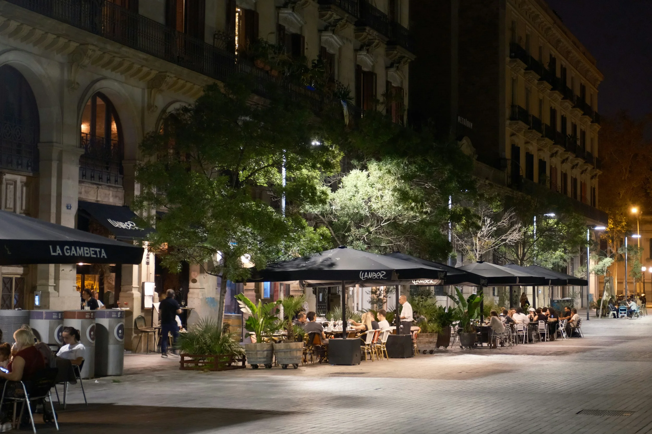 people eating outstide barcelona night time