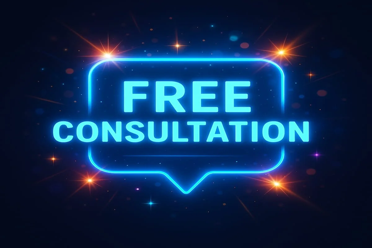 Bright neon Free Consultation sign with glowing blue light effects and colorful sparkles on dark background.