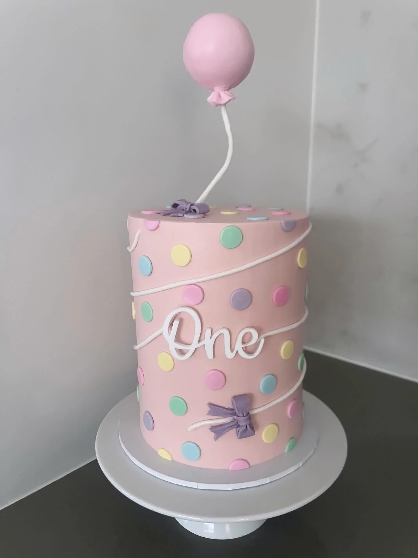 A very sweet cake for a very special one year old! 
Soft pastels, polka dots &amp; lots of love 💕
@jburt_86 @axeljones 

@the_little_arch_co