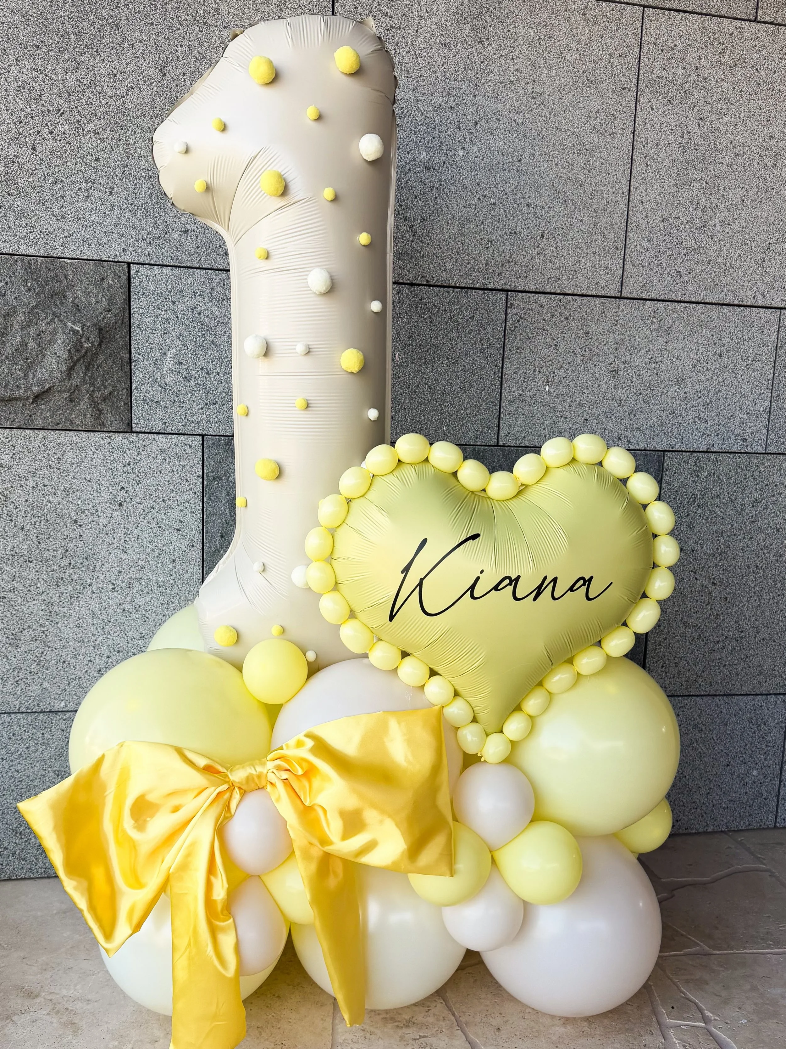 ONE LOOK AND WE&rsquo;RE IN LOVE! 💛🎀

A little sunshine, a little satin and a whole lot of pretty!

The sweetest statement number for the beautiful Kiana 🫶🏻 Celebrating her first birthday.

Safe to say, we&rsquo;re absolutely obsessed with this o
