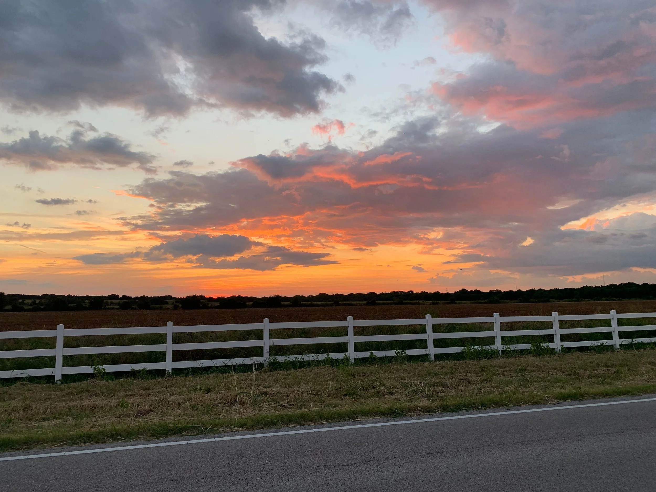 Sunset over a rural Texas pasture in Belton, near Austin -- online therapy available throughout Texas at Seek the Sun Psychotherapy.