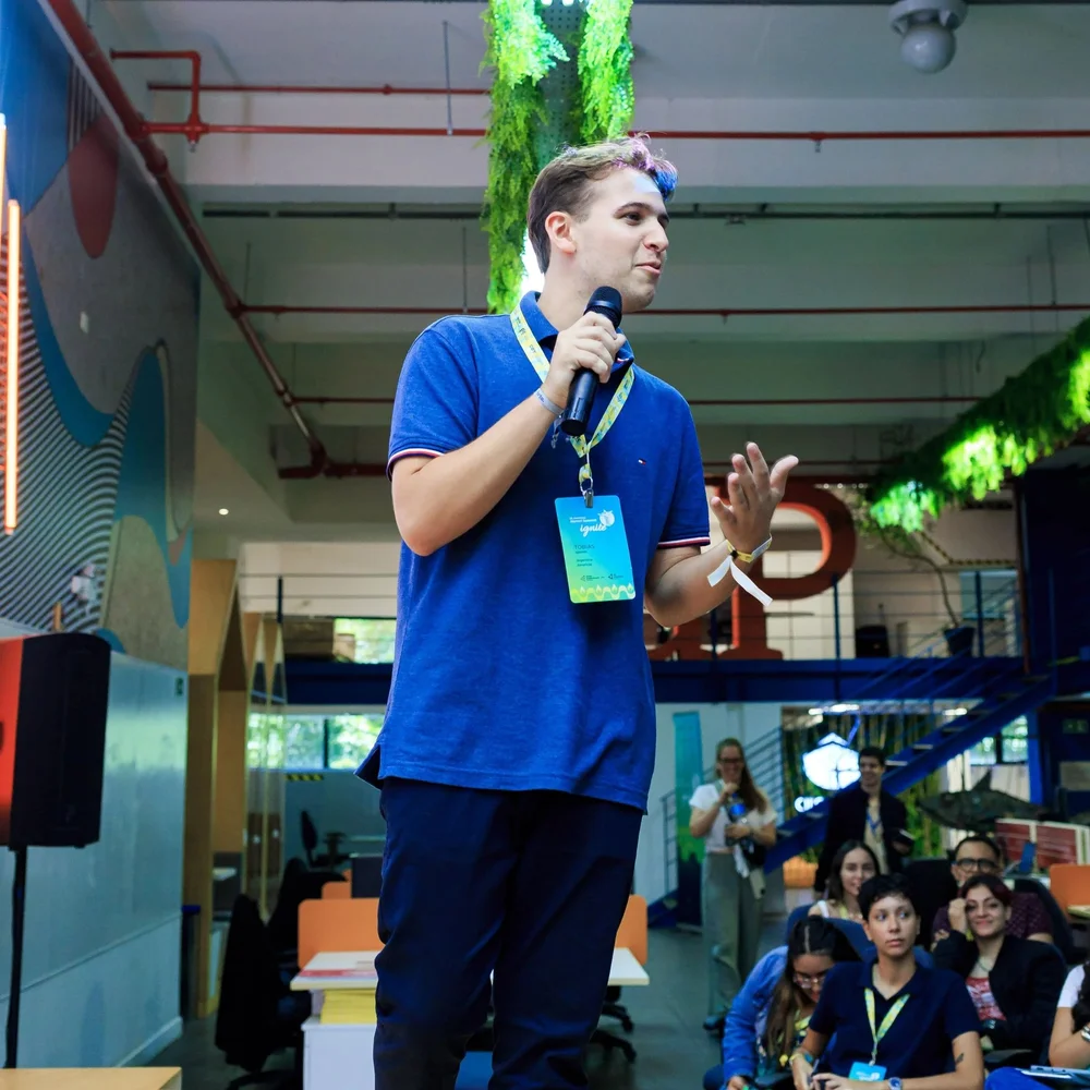 Tobias speaking at a JA Americas Alumni event