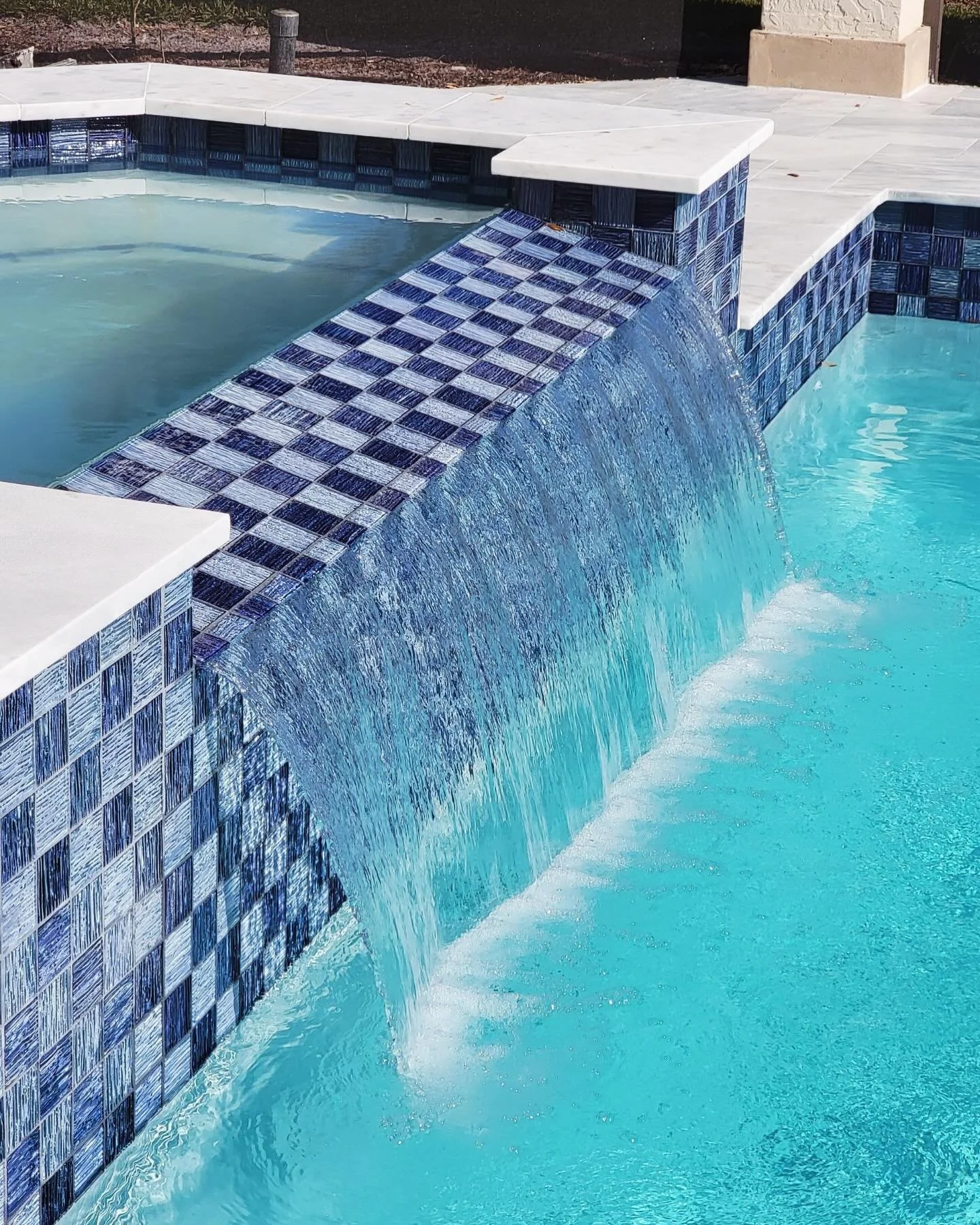A fresh new start! Welcoming in the new year with this stunning waterfall! 💯 
.
.
.
#BetterCallSalPools #poolrenovation #pooldesign #poolwaterfall #pooltile
