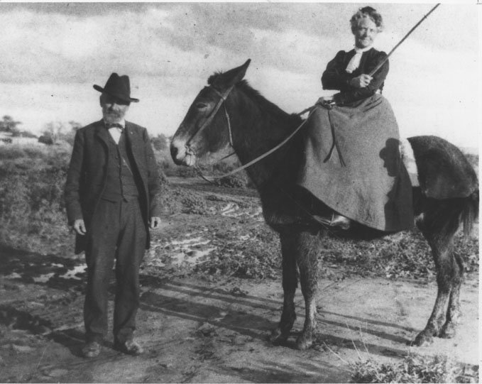 Retired U.S. Army Chaplain Winfield S. Scott and his wife Helen pose in 1900 with their mule "Old Maud" in Scottsdale, Arizona, where they established a homestead in 1888.