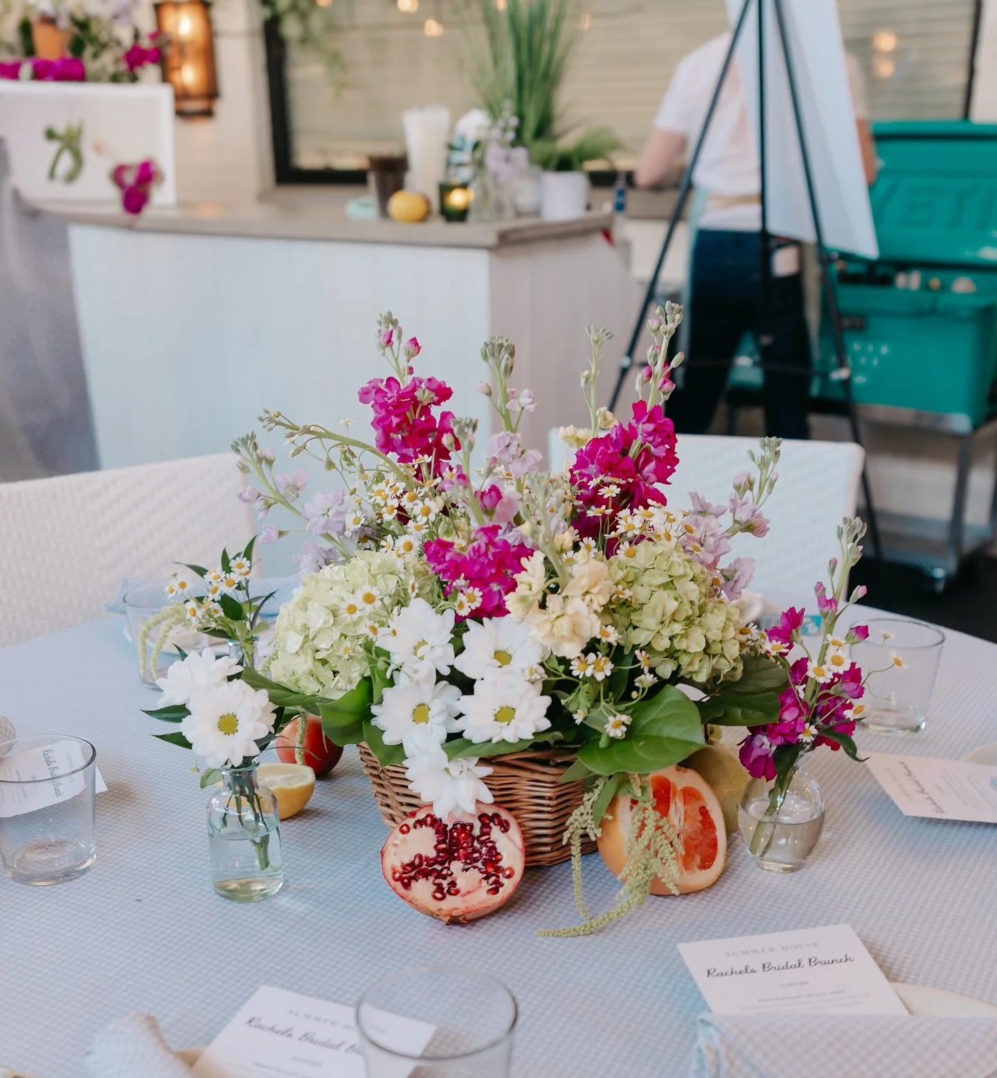 Freshly picked and ready for the aisle! 💐 We had a blast creating these colorful centerpieces for a &lsquo;Fresh off the Market&rsquo; bridal shower at Summerhouse in Chicago. Wicker baskets, vibrant blooms, and juicy fruits&mdash;a match made in he