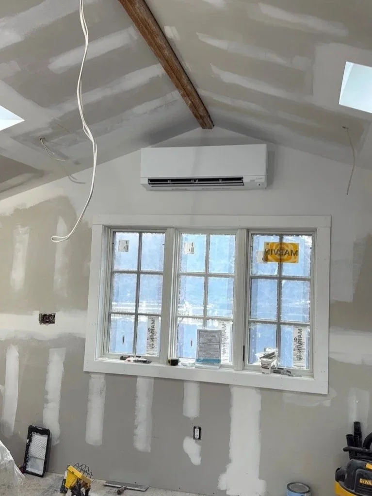 Indoor mini-split unit electrical rough-in and installation by RM Electric & Plumbing, part of a residential new construction project in the Hudson Valley.