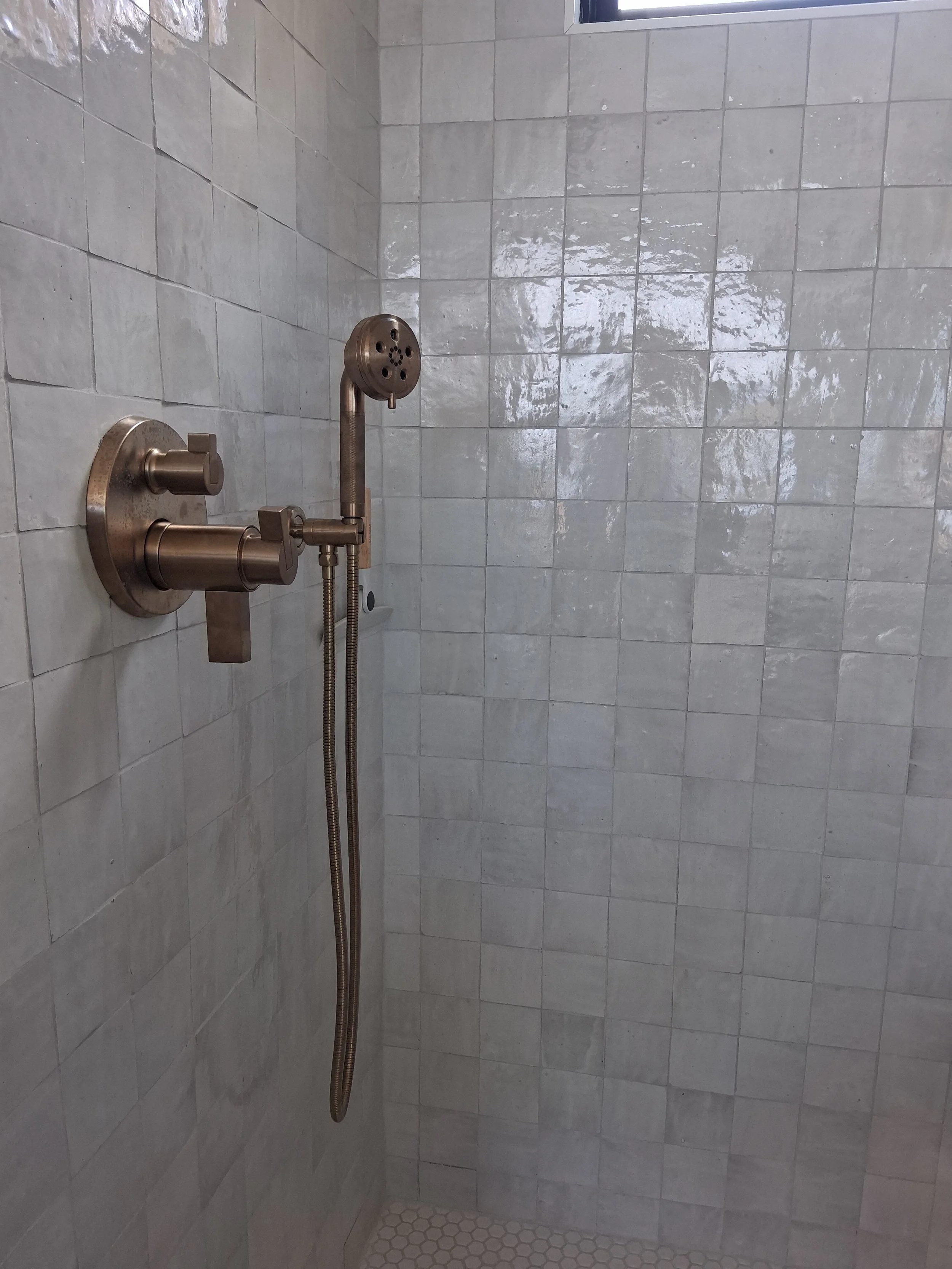 Designer shower fixture installation and finish plumbing by RM Electric & Plumbing. Specialist in modern bathroom renovations and luxury fixture upgrades across the Hudson Valley.