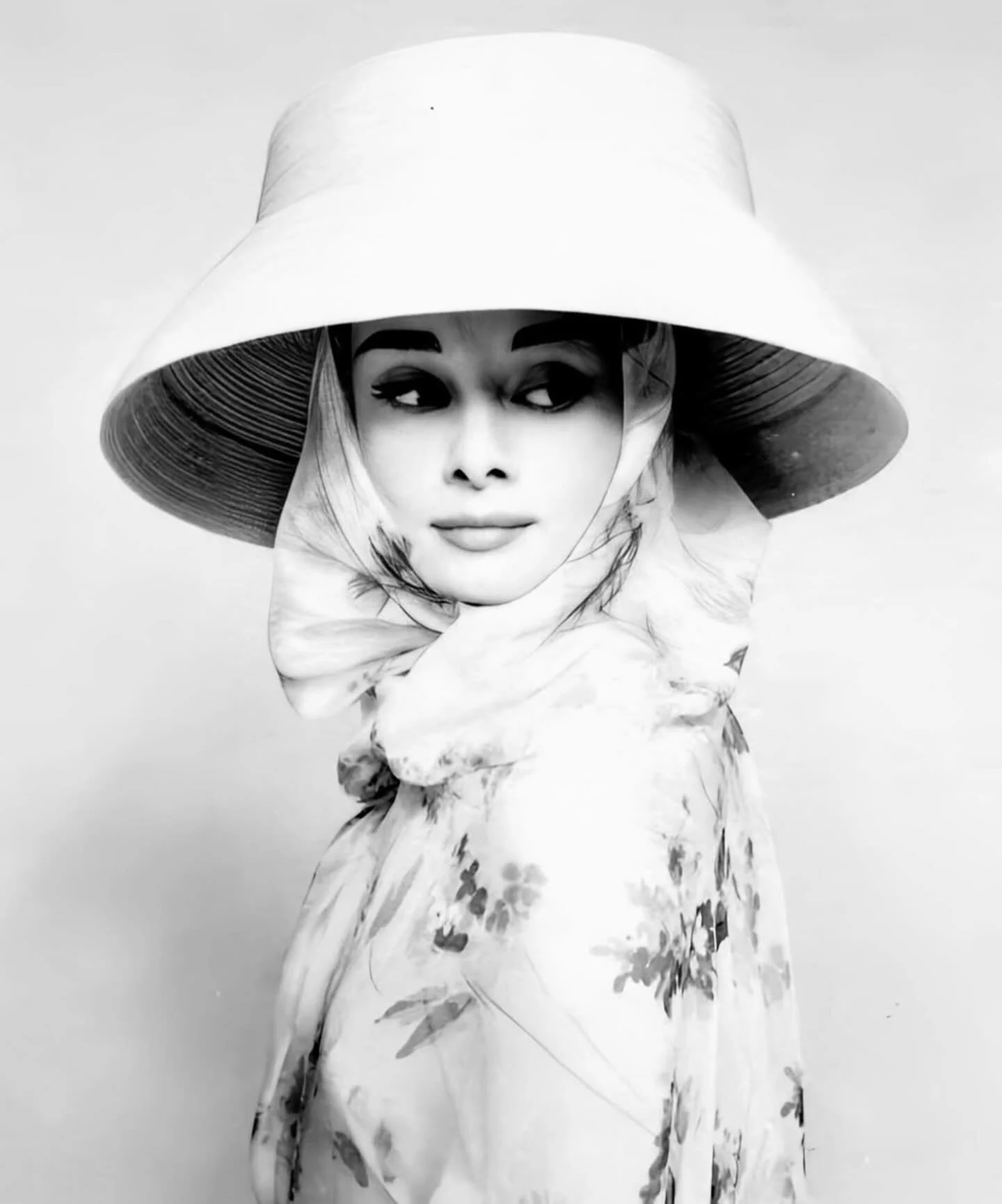 Audrey Hepburn, Paris, 1956 by Richard Avedon | Throughout her career, Audrey Hepburn returned to Richard Avedon&rsquo;s lens again and again. Avedon captured not just her beauty, but the charisma and playfulness she carried off-screen, helping shape