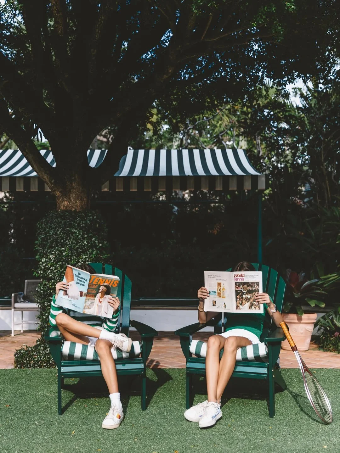 Courtside Seats by Nick Mele, from Tennis Anyone? - a sun-soaked nod to the mischief and glamour of youth, where country club polish meets a streak of playful rebellion. | To learn more about available works by Nick Mele please get in touch with our 