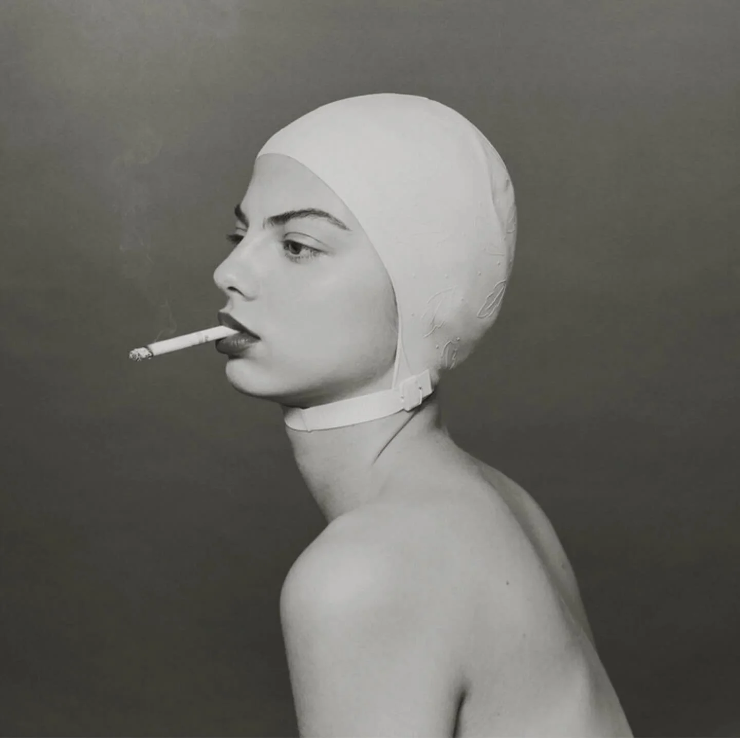 Swim Cap by Tyler Shields

Swipe right to view the platinum palladium edition, a rare printing process using platinum and palladium metals instead of traditional silver. Known for its incredible tonal range and matte, almost velvety finish, each prin