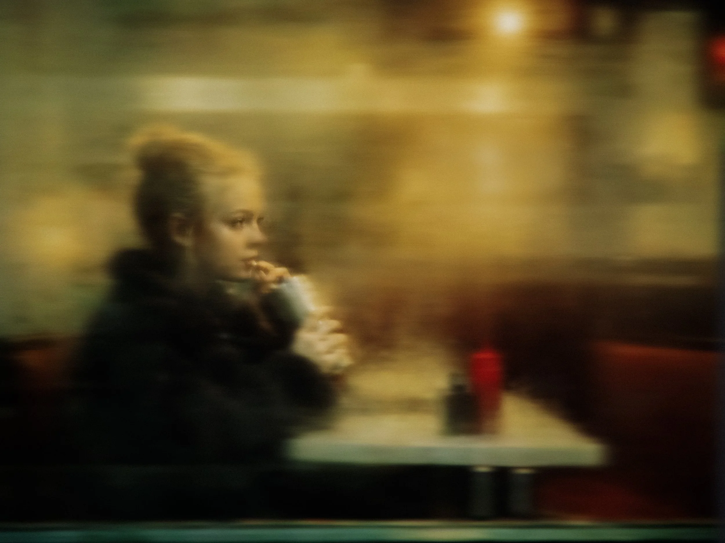 The Girl in the Diner Window by Tyler Shields
