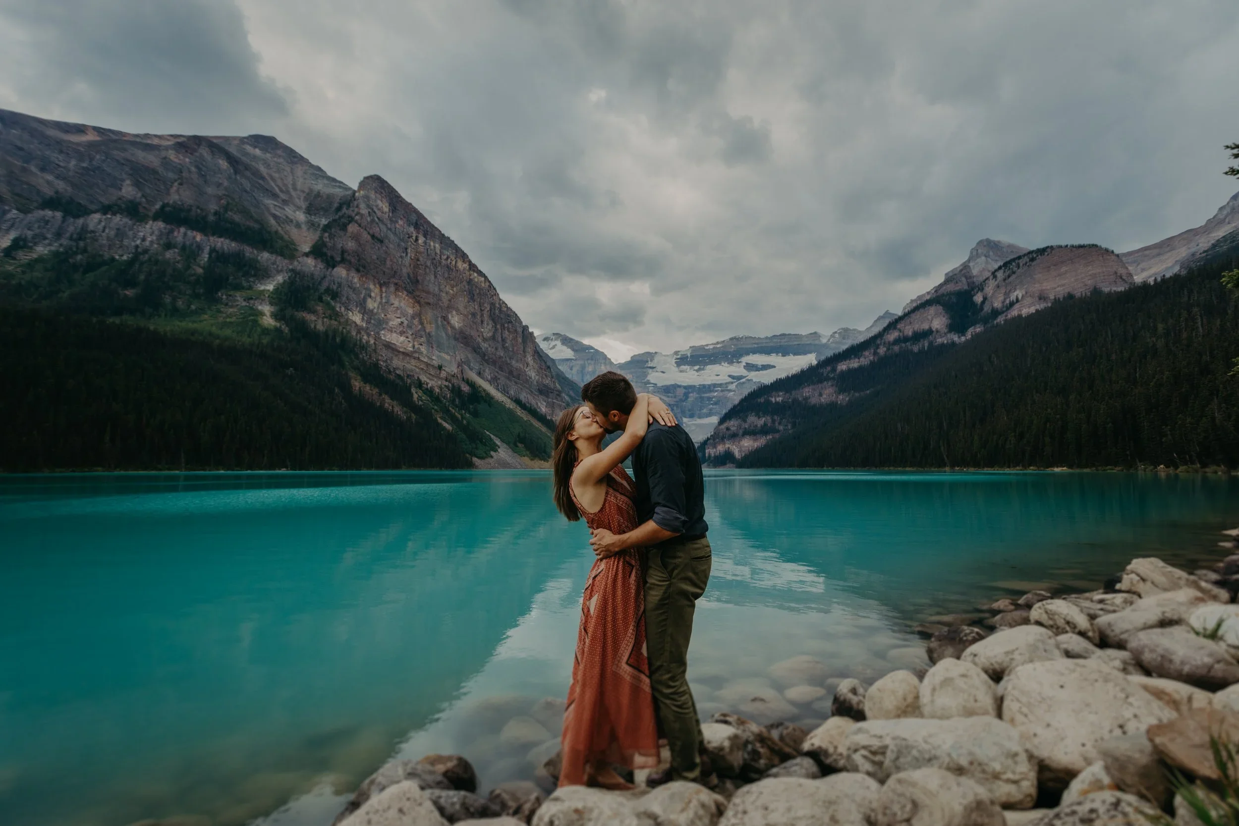 Couple wearing neutral outfits during Banff engagement photos