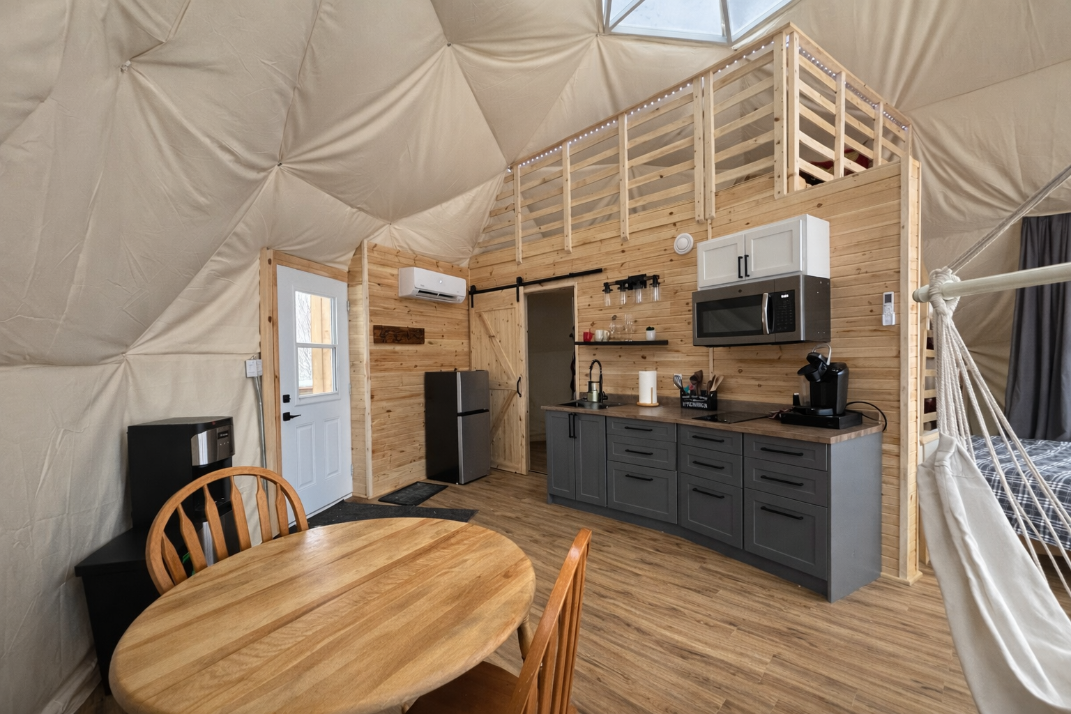 Fully equipped kitchen inside luxury glamping dome PEI