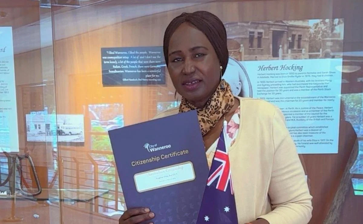 Angelina proudly holding her City of Wanneroo Australian Citizenship Certificate