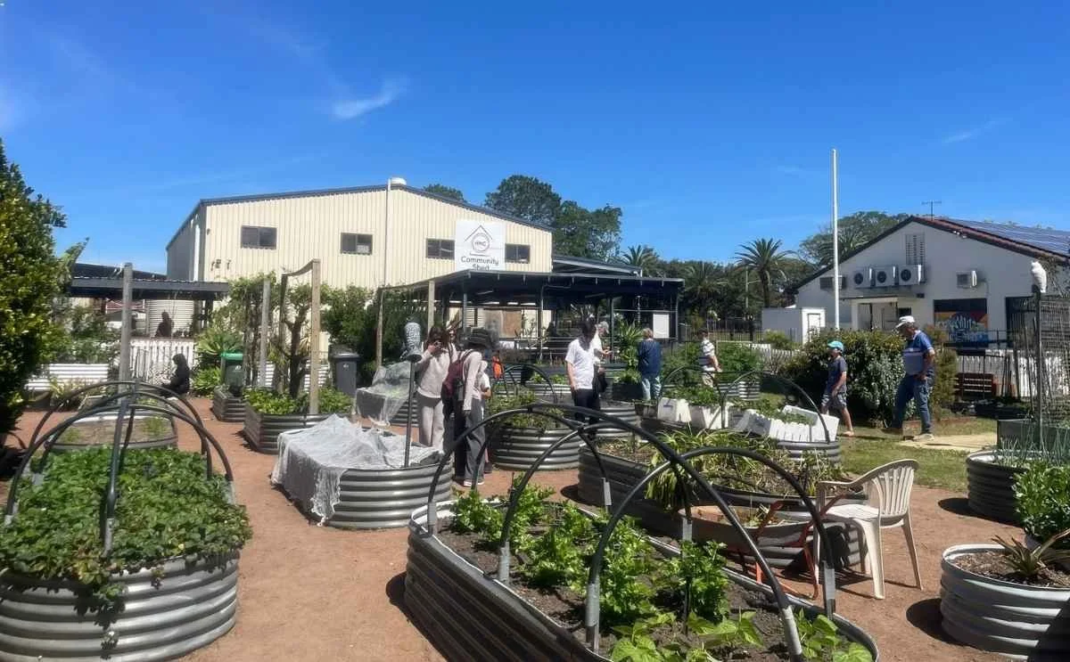 AMEP students exploring the Waratah Hunter Community Garden during an outdoor English class in Newcastle