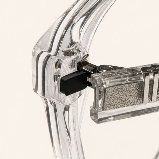 Close-up of TempleFix applied inside the arm of a pair of glasses beside the hinge.