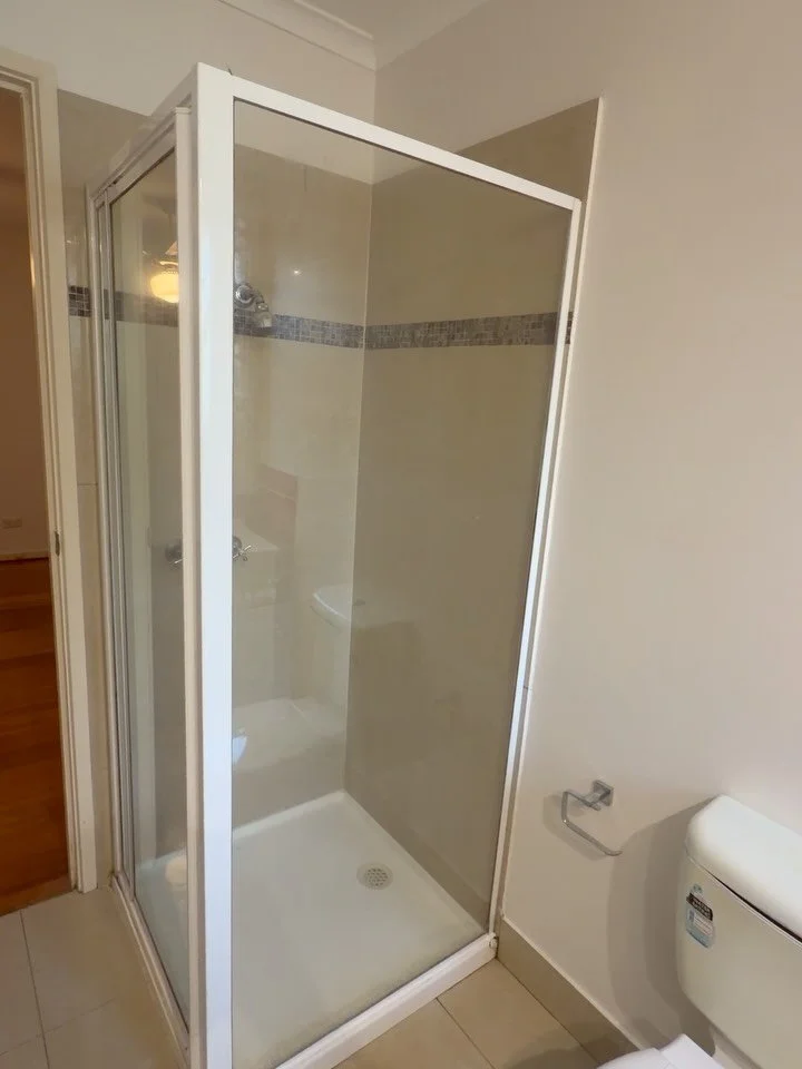 Shower screen fixed panel replacement with our Aussie made 6.38mm clear laminate safety glass for our real estates rental client. Along with hooking up 2 existing exhaust fans in both bathrooms to the light switches and reinstating the privacy fence.