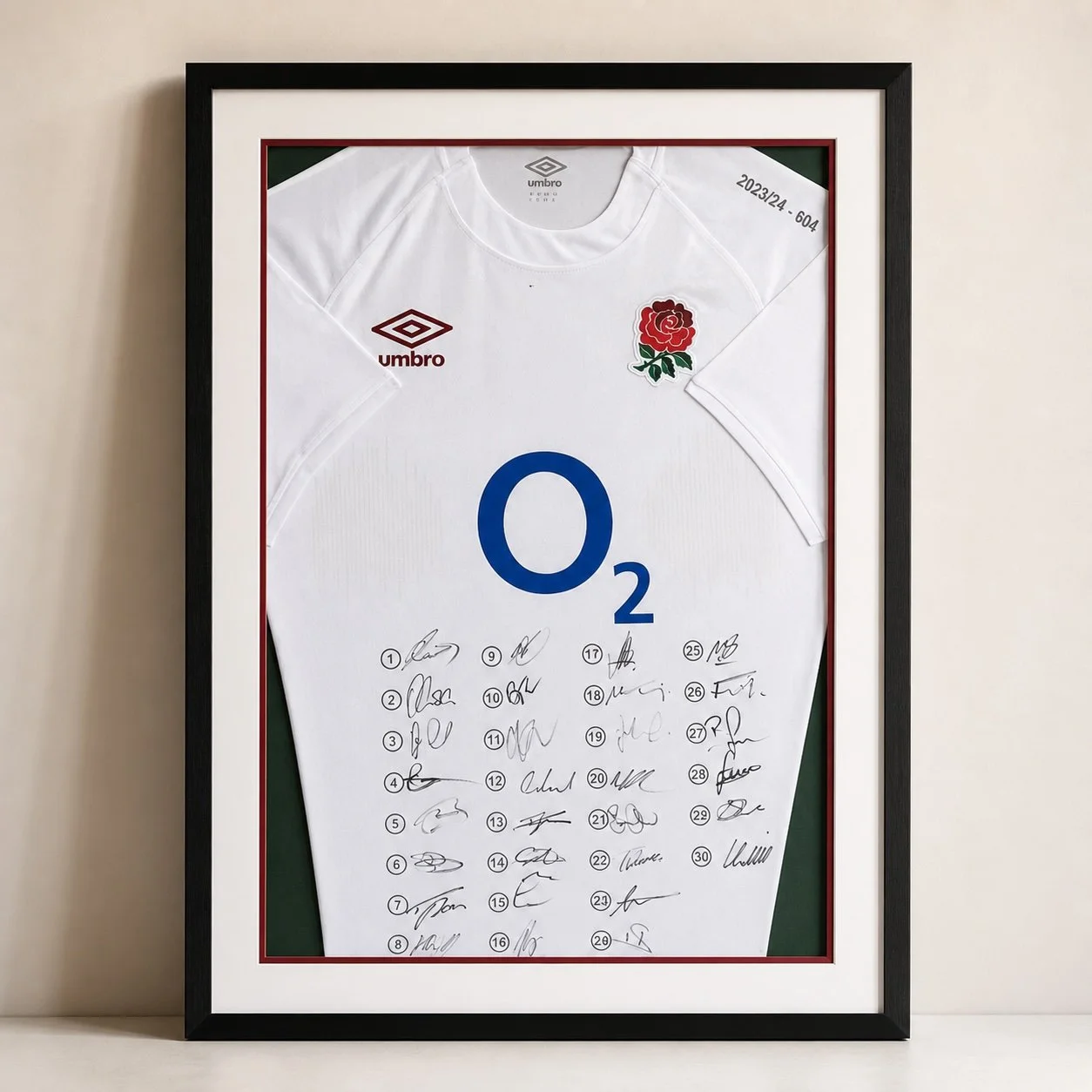 Sports Shirt Framing — Custom rugby shirt layout to protect and display signed pieces clearly.