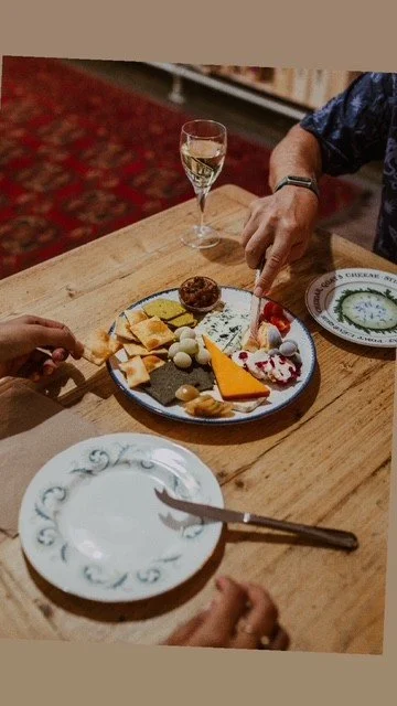 cheeseplate being eaten.jpeg