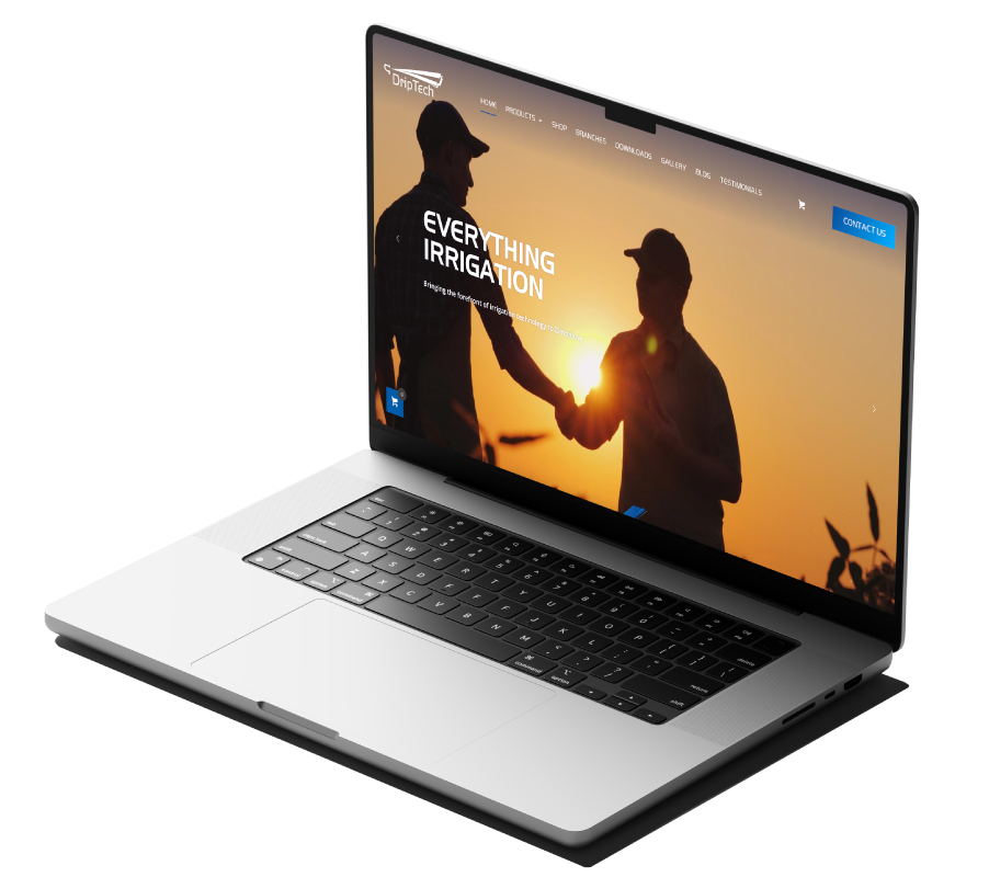 Laptop displaying a website with a sunset background and the text "EVERYTHING IRRIGATION" with two people shaking hands in silhouette.