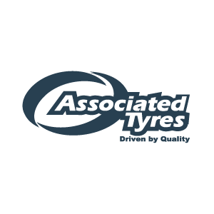 Associated Tyres logo with a stylized T and slogan 'driven by quality'