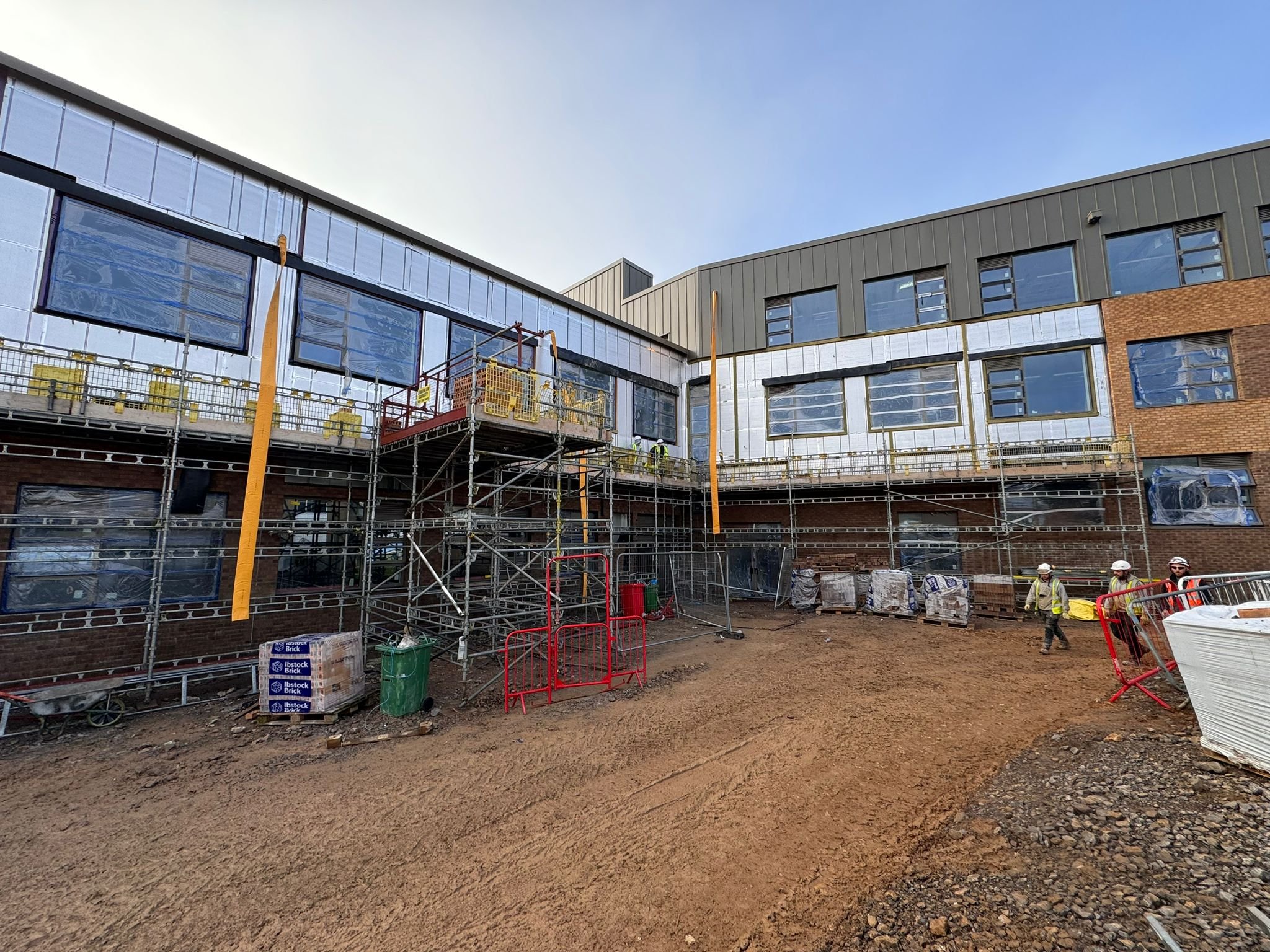 Construction site with scaffolding on building exterior