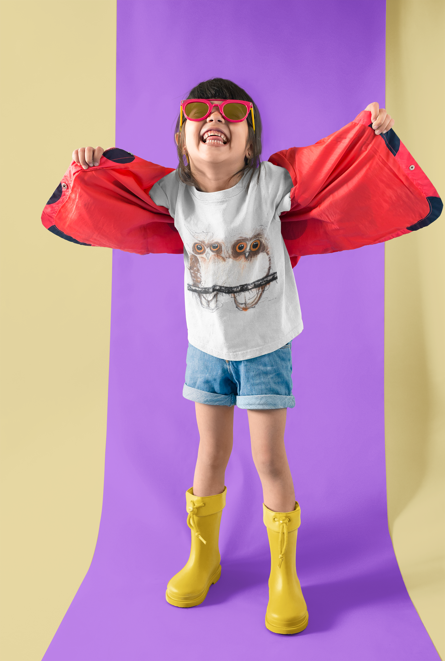 little-girl-playing-with-her-red-jacket-wearing-a-tshirt-mockup-in-a-two-colors-room-a19473 (2).png