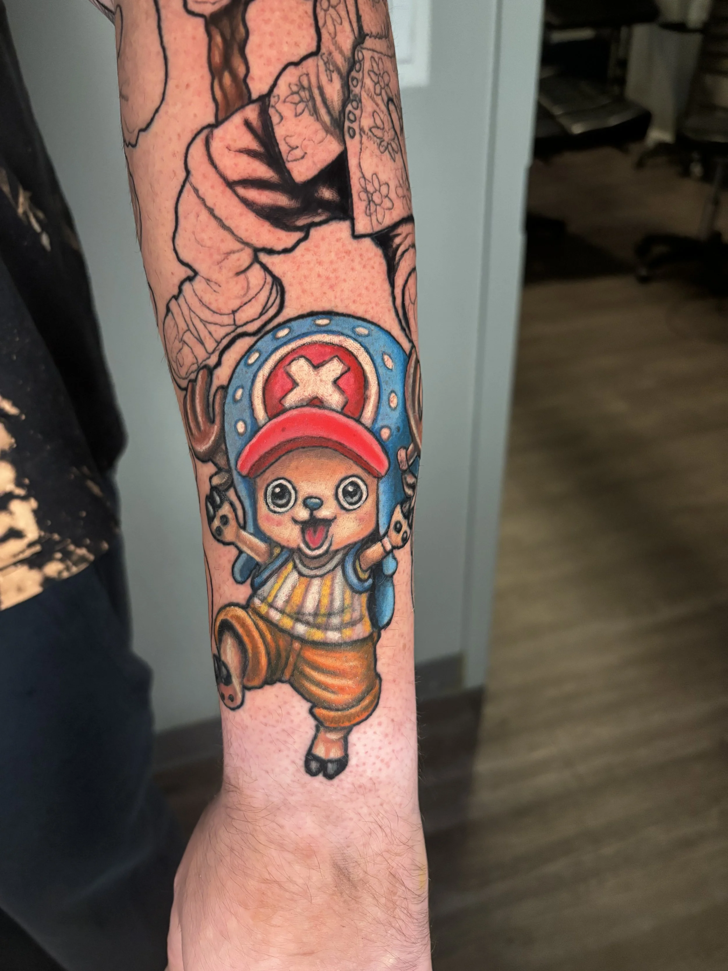 Chopper Anime color forearm tattoo