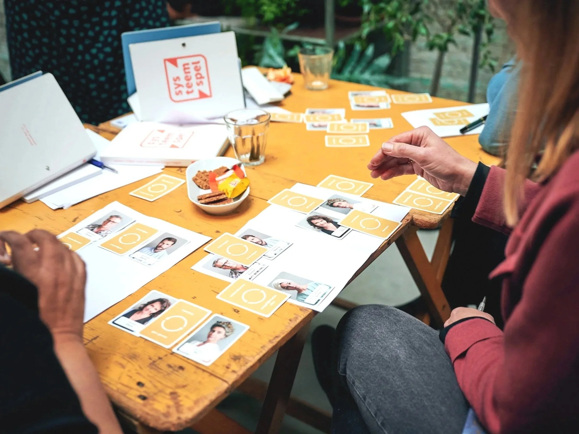Interactive board game exercise used in systems thinking training