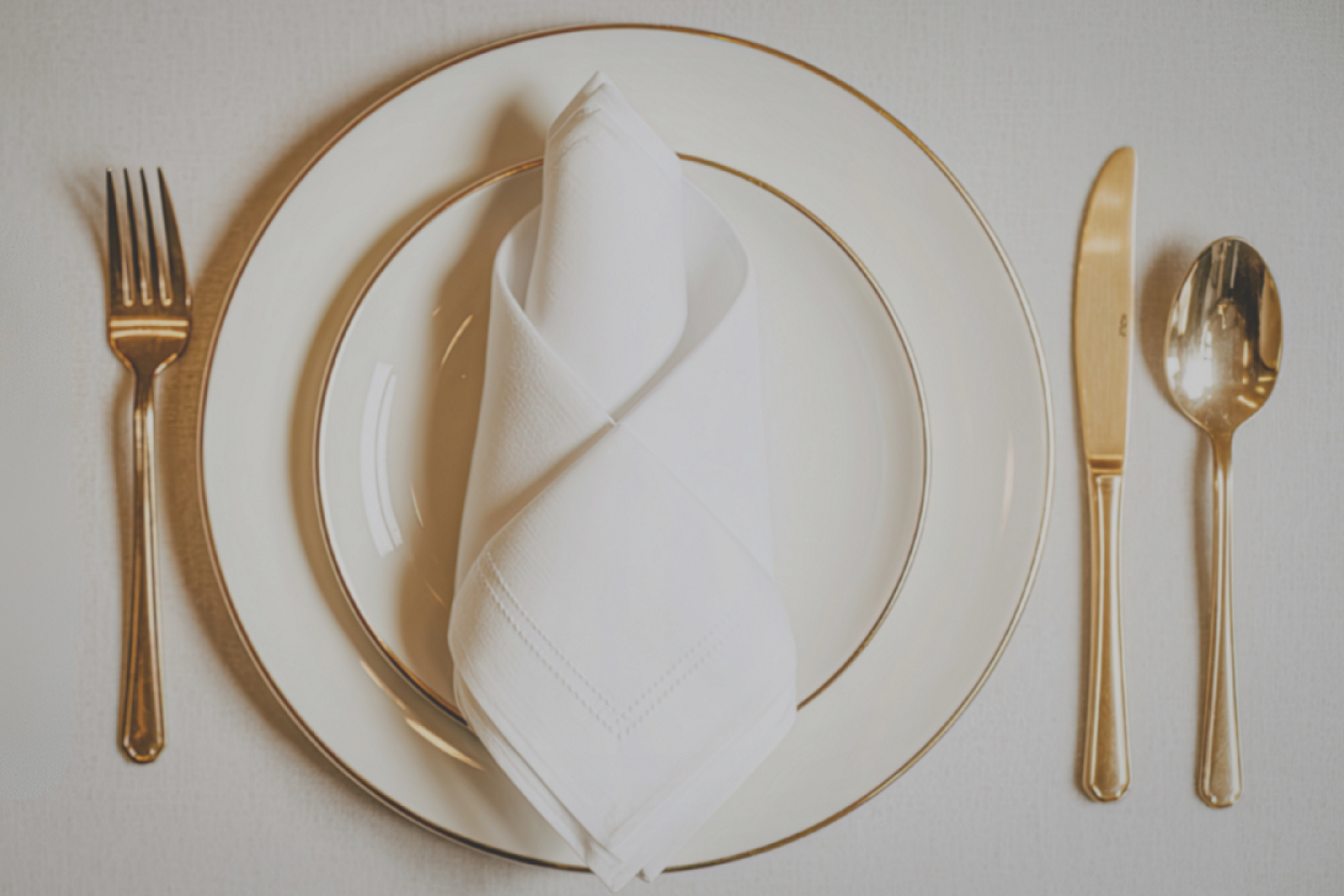 The Parisian Lunch as a Turing Test: What “Bon Appétit” Really Says About Your Rank