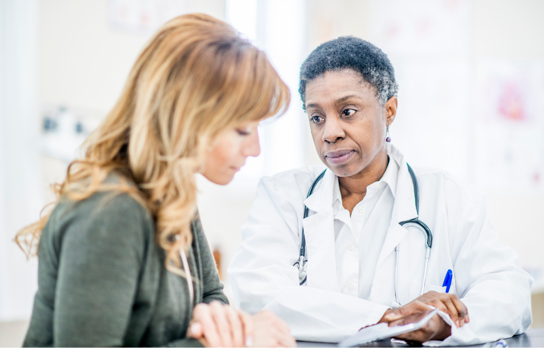 A doctor consulting with a patient.
