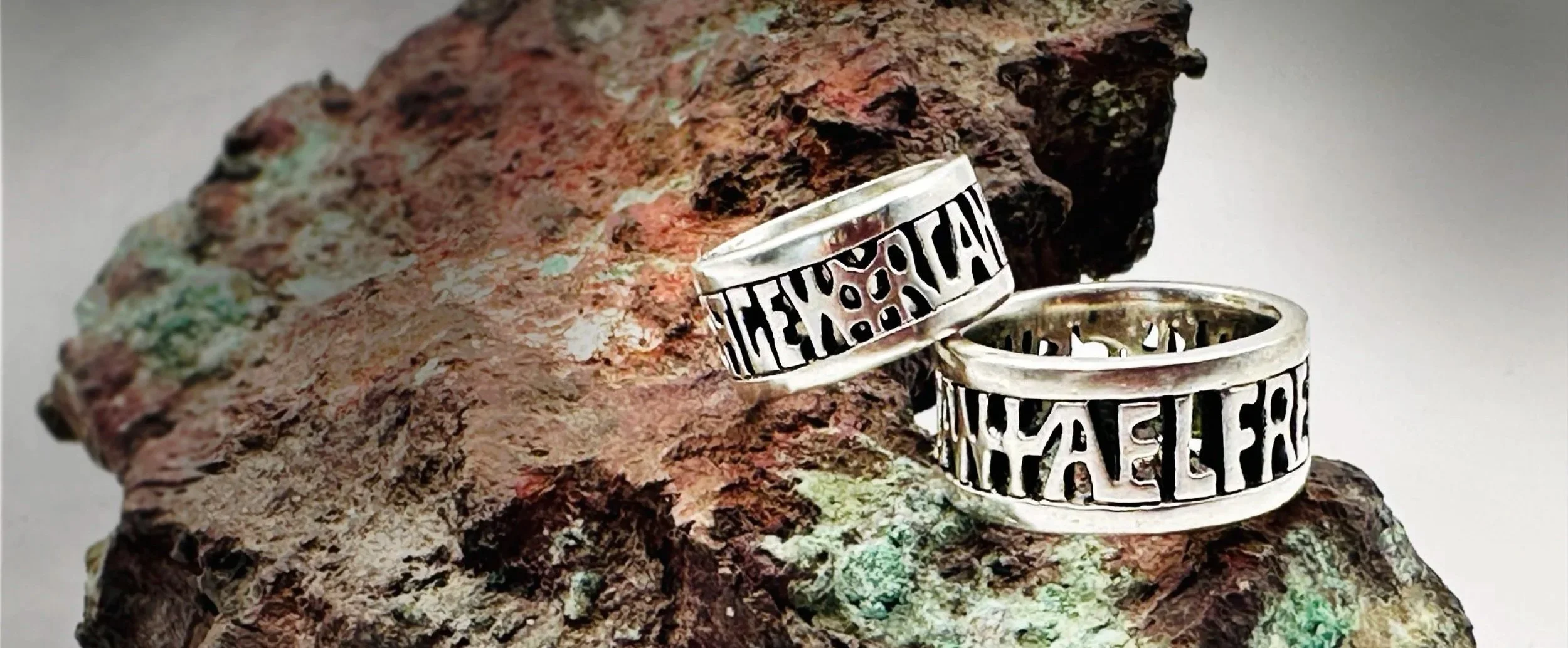 Two handmade sterling silver King Alfred the Great rings inspired by the Alfred Jewel, Anglo-Saxon and Viking era, on tin ore