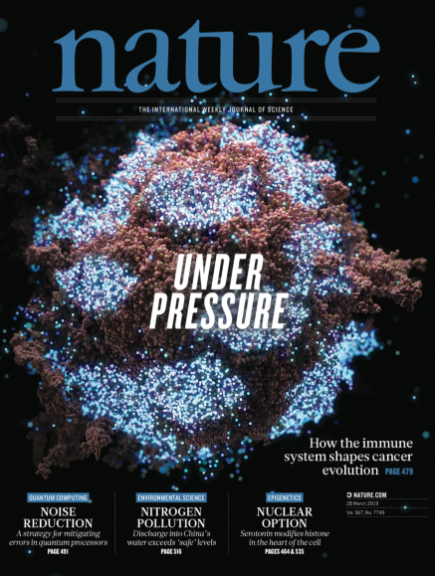 Cover of Nature magazine featuring a colorful virus illustration, with headlines about immune system, cancer, pollution, and quantum computing.