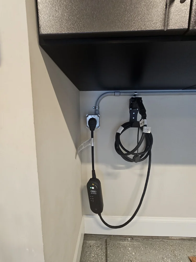 Garage EV charging connection installed by Loftis Lighting & Electrical.