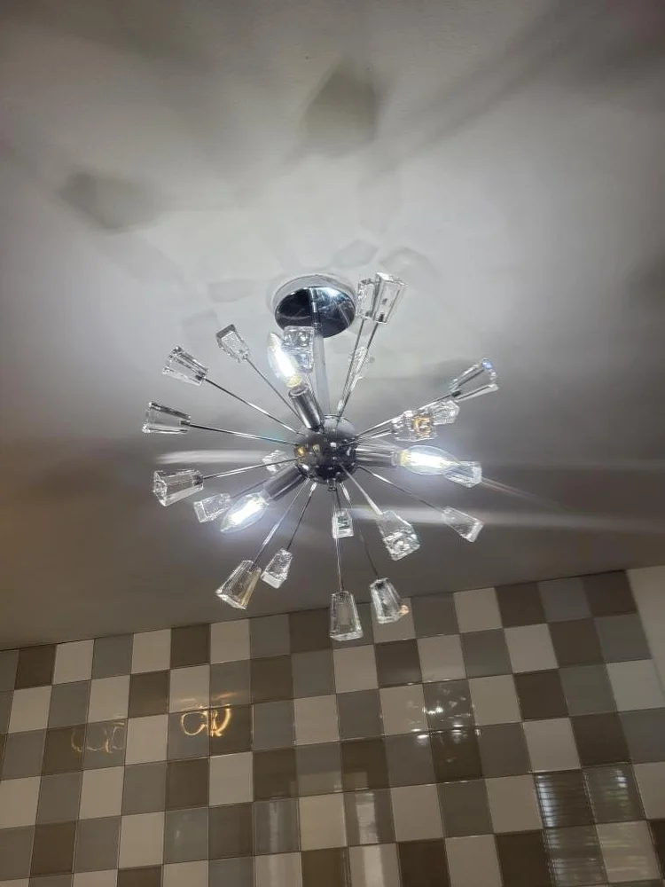 Illuminated starburst chandelier