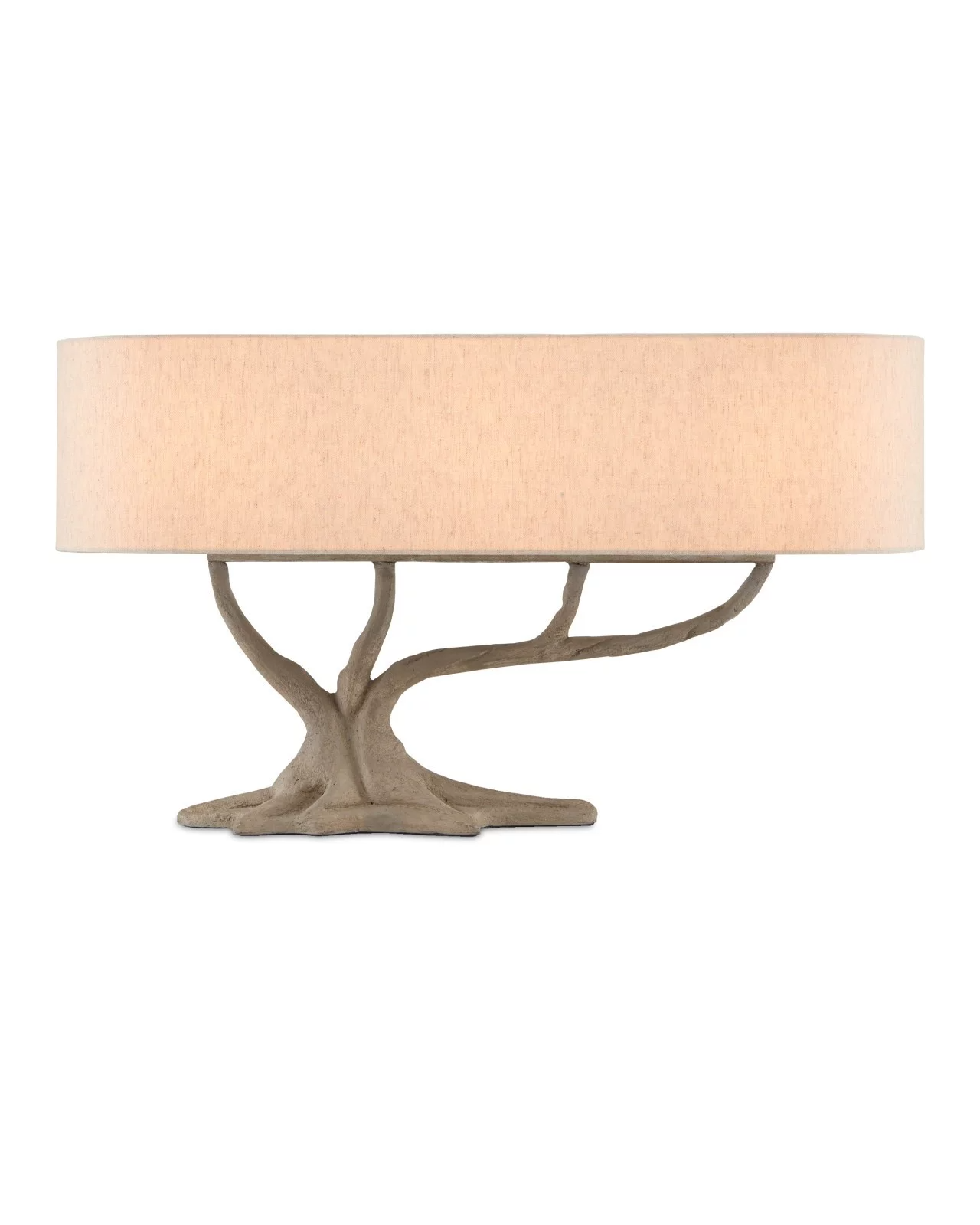 Table lamp with a base designed to look like a tree branch and a pink fabric shade.